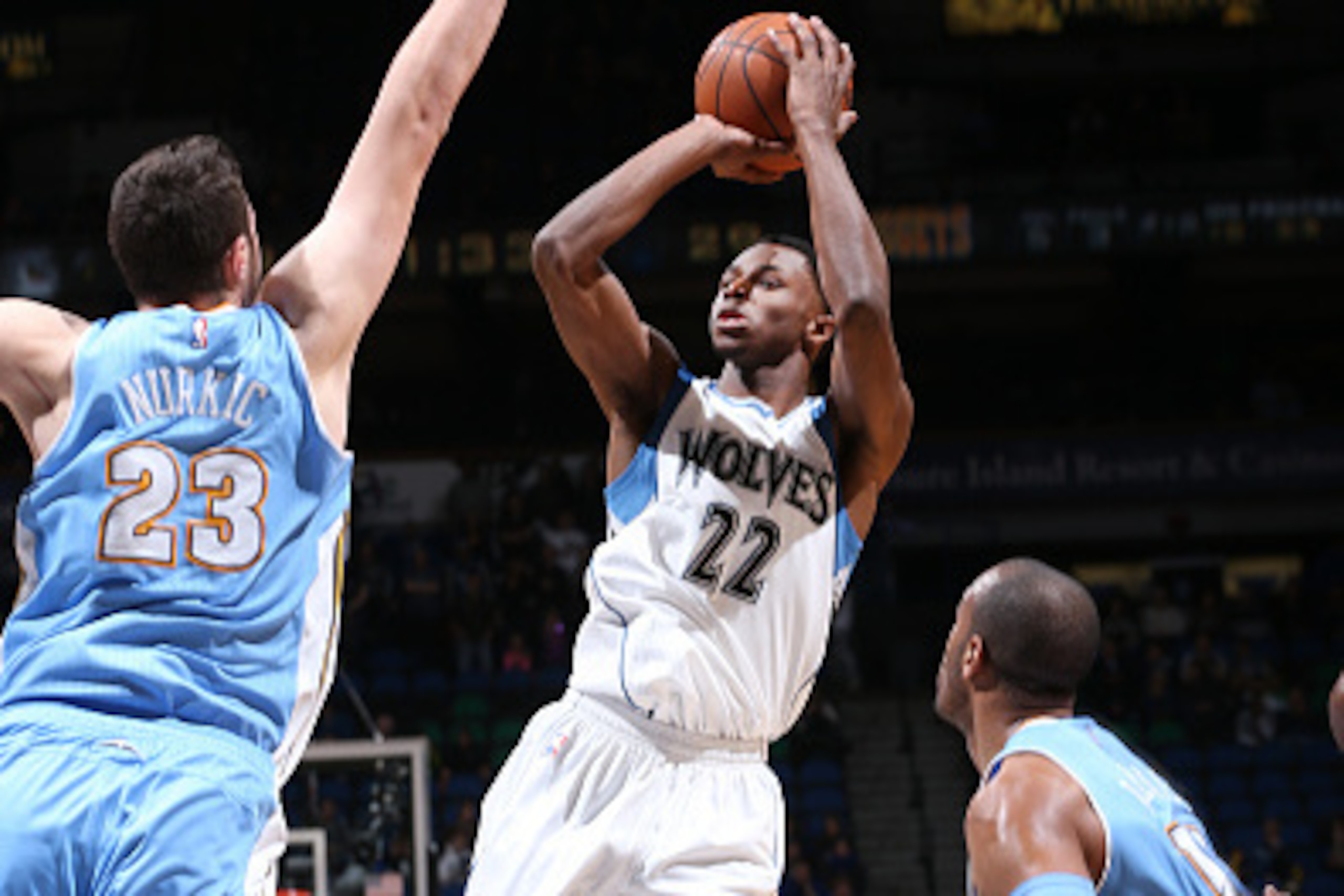 MINNEAPOLIS, MN -  JANUARY 5: Andrew Wiggins #22 of the Minnesota Timberwolves shoots against the Denver Nuggets during the game on January 5, 2015 at Target Center in Minneapolis, Minnesota. NOTE TO USER: User expressly acknowledges and agrees that, by d