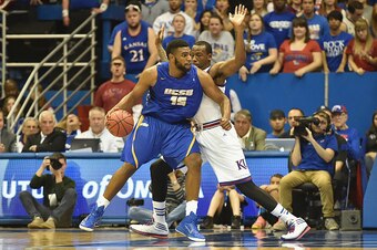 LAWRENCE, KS - NOVEMBER 14:  Alan Williams #15 of the UC Santa Barbara Gauchos posts up Cliff Alexander #2 of the Kansas Jayhawks in the second half at Allen Fieldhouse on November 14, 2014 in Lawrence, Kansas. (Photo by Michael B. Thomas/Getty Images)