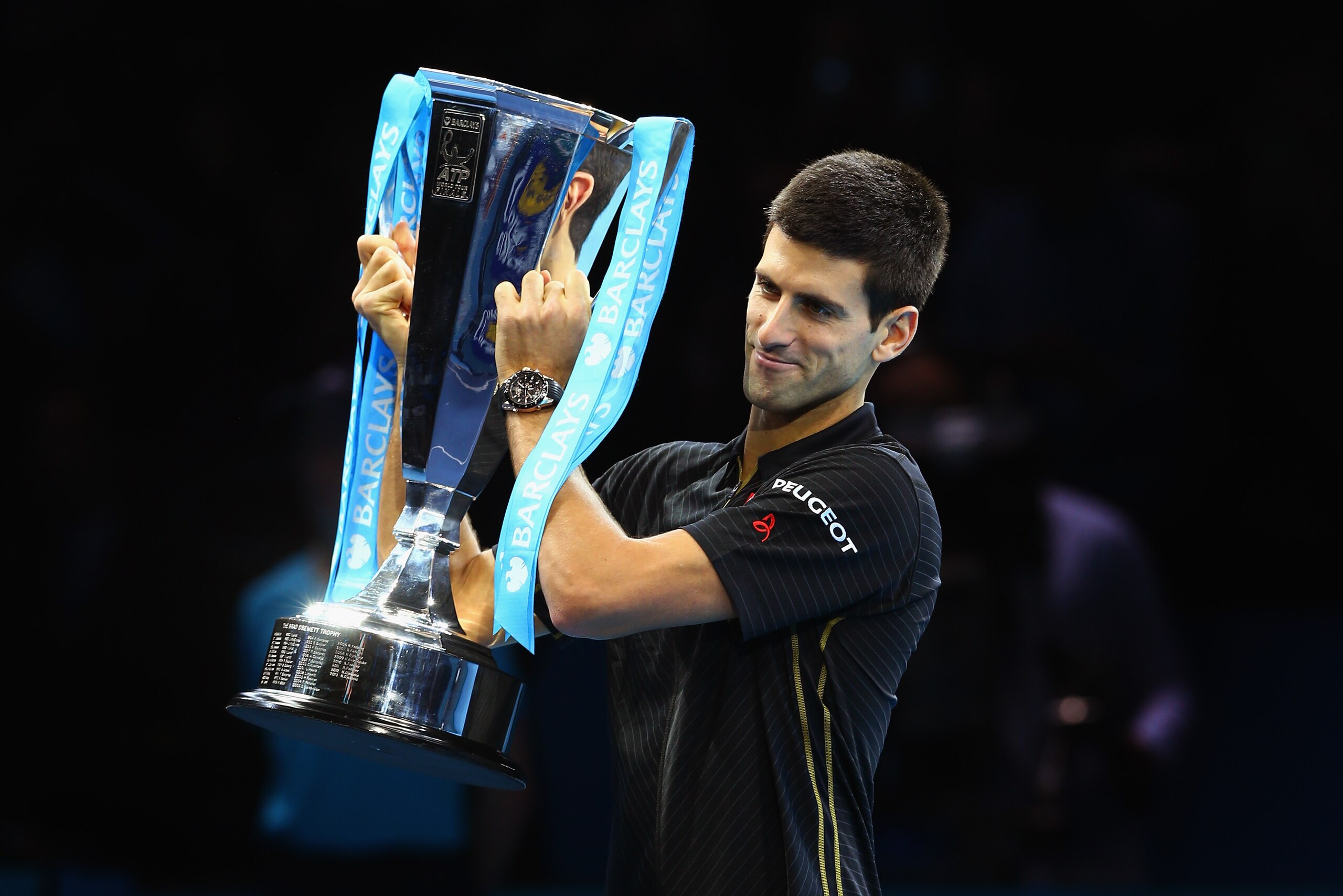LONDON, ENGLAND - NOVEMBER 16:  Novak Djokovic of Serbia poses with the ATP trophy on day eight of the Barclays ATP World Tour Finals at O2 Arena on November 16, 2014 in London, England.  (Photo by Clive Brunskill/Getty Images)