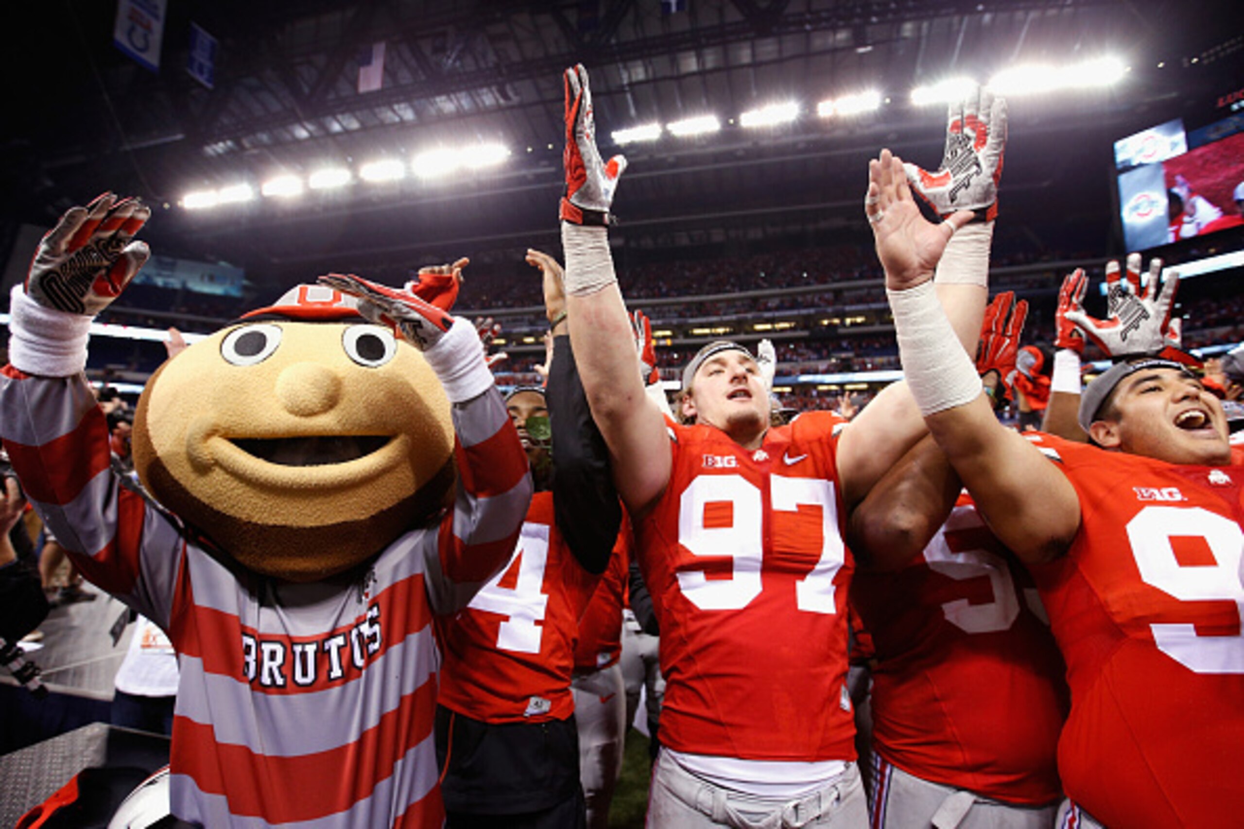 INDIANAPOLIS, IN - DECEMBER 06:  The Ohio State Buckeyes mascot, Brutus, celebrates with the Buckeyes after they won the Big Ten Championship 59-0 over the Wisconsin Badgers at Lucas Oil Stadium on December 6, 2014 in Indianapolis, Indiana.  (Photo by Joe