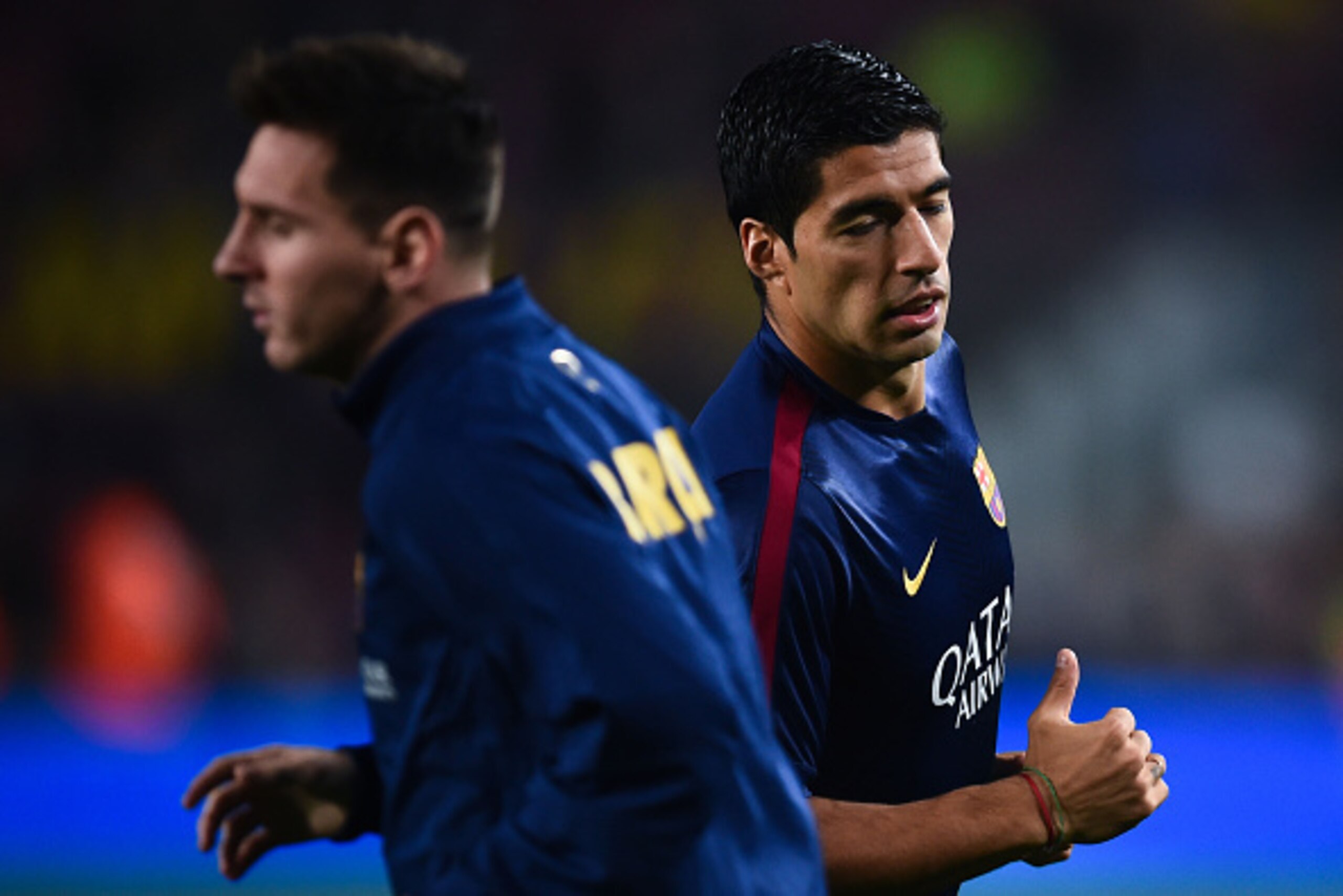 BARCELONA, SPAIN - NOVEMBER 22:  Lionel Messi and Luis Suarez of FC Barcelona in action during the warm-up prior to the La Liga match between FC Barcelona and Sevilla FC at Camp Nou on November 22, 2014 in Barcelona, Spain. Lionel Messi beat the  number o