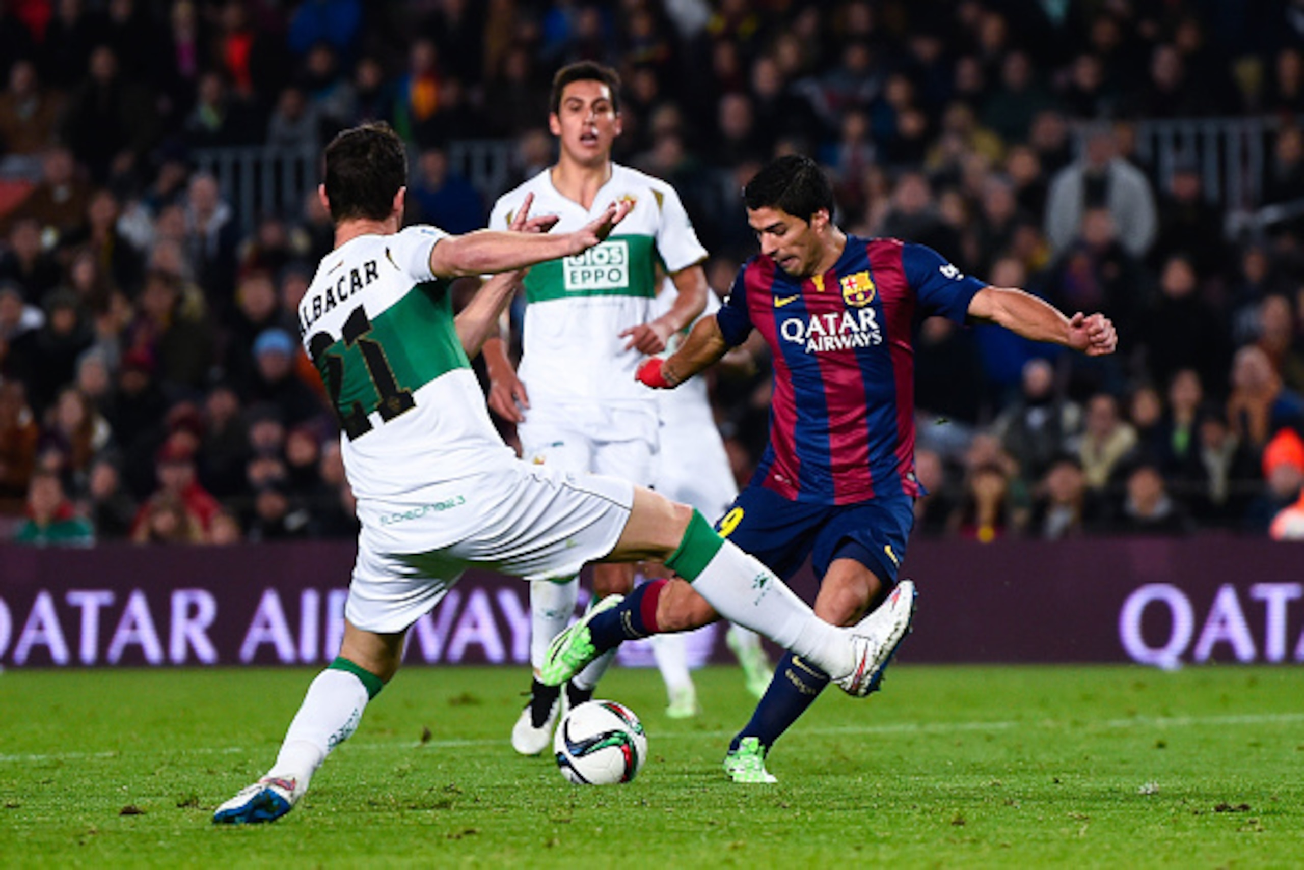BARCELONA, SPAIN - JANUARY 08:  Luis Suarez of FC Barcelona scores his team's second goal during the Copa del Rey Round of 16 First Leg match between FC Barcelona and Elche CF at Camp Nou on January 8, 2015 in Barcelona, Spain.  (Photo by David Ramos/Gett