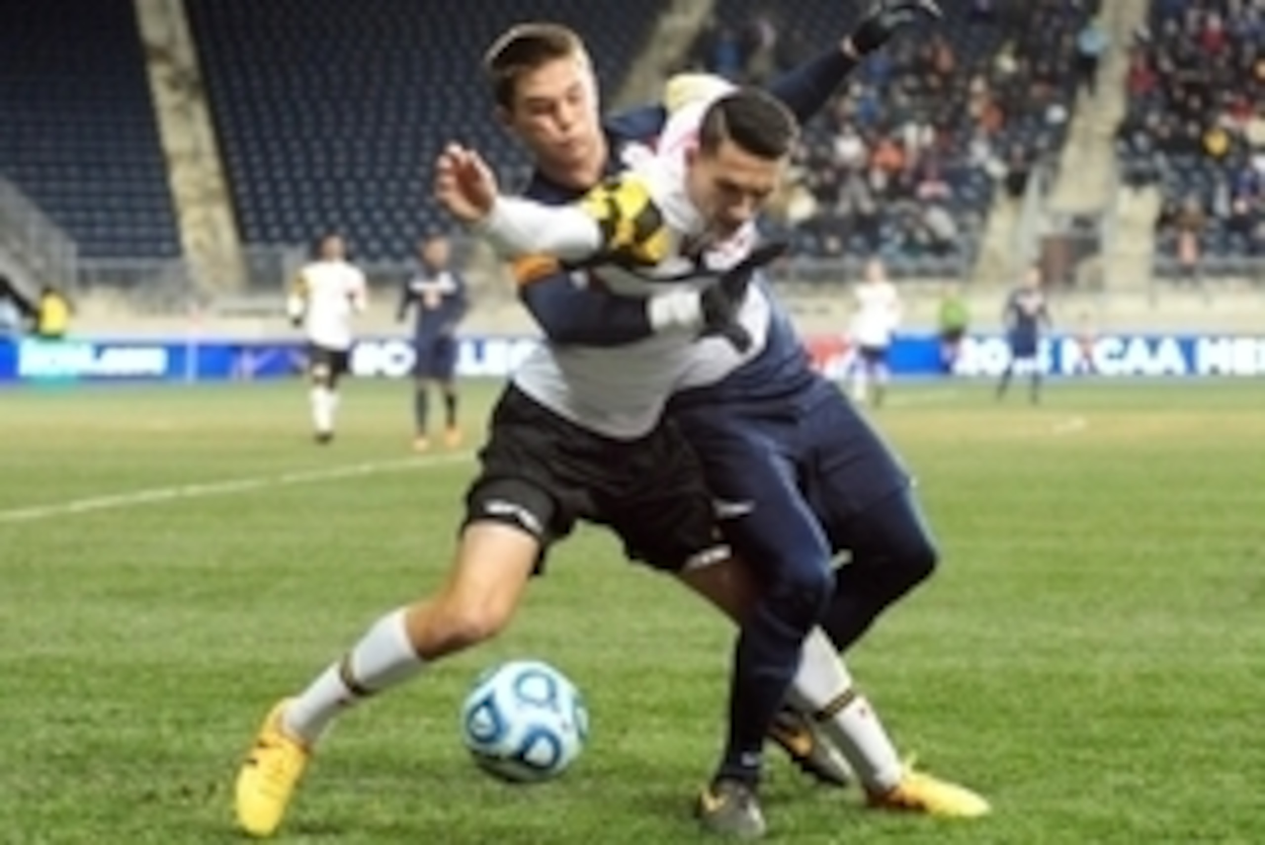 Dec 13, 2013; Chester, PA, USA; Maryland Terrapins midfielder Dan Metzger (7) fights for the ball with Virginia Cavaliers midfielder Eric Bird (11) at PPL Park. Mandatory Credit: Evan Habeeb-USA TODAY Sports Dec 13, 2013; Chester, PA, USA; Maryland Terrapins midfielder Dan Metzger (7) fights for the ball with Virginia Cavaliers midfielder Eric Bird (11) at PPL Park. Mandatory Credit: Evan Habeeb-USA TODAY Sports