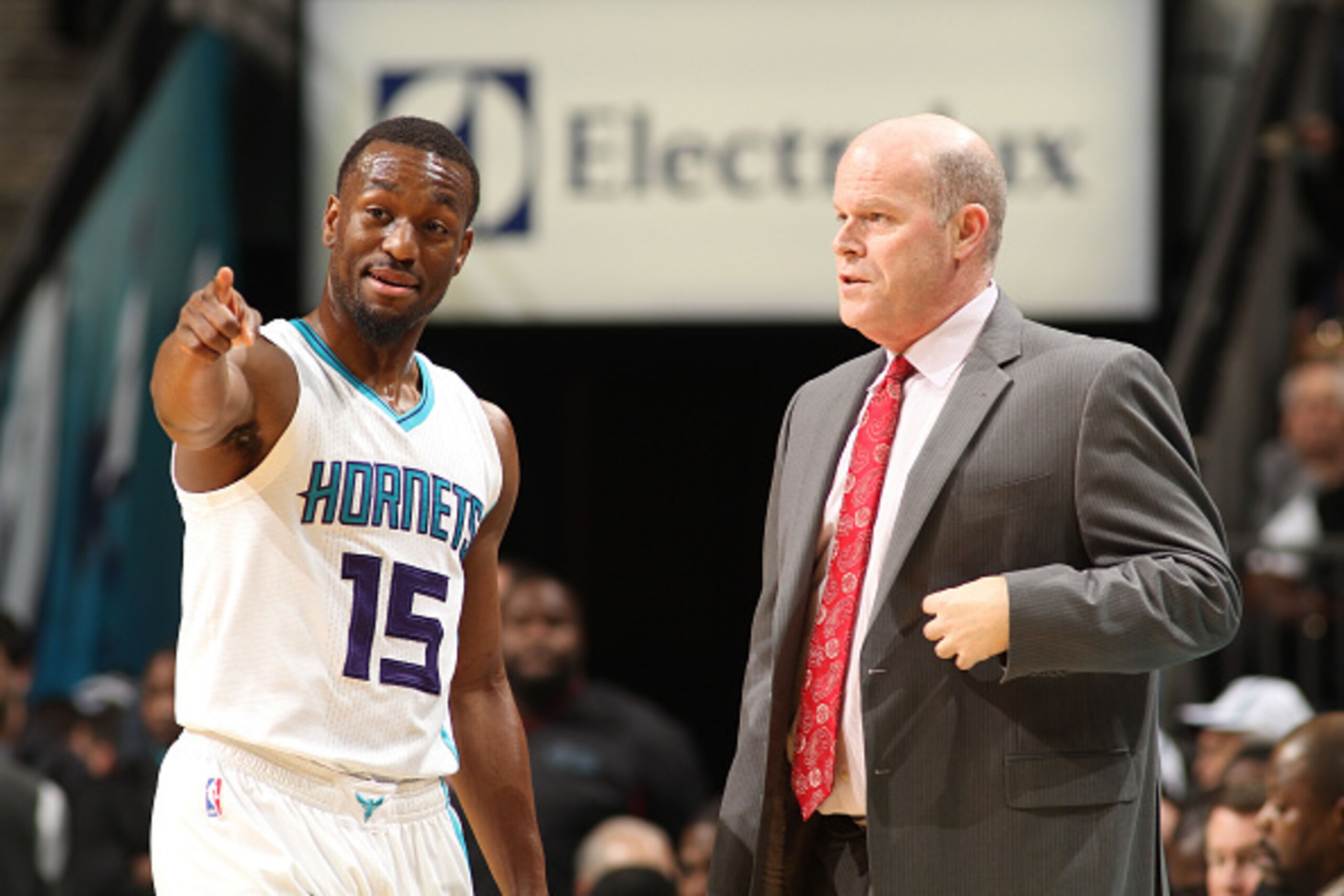 CHARLOTTE, NC - DECEMBER 27:  Kemba Walker #15 of the Charlotte Hornets chats with head coach Steve Clifford during the game against the Orlando Magic at the Time Warner Cable Arena on December 27, 2014 in Charlotte, North Carolina. NOTE TO USER: User exp