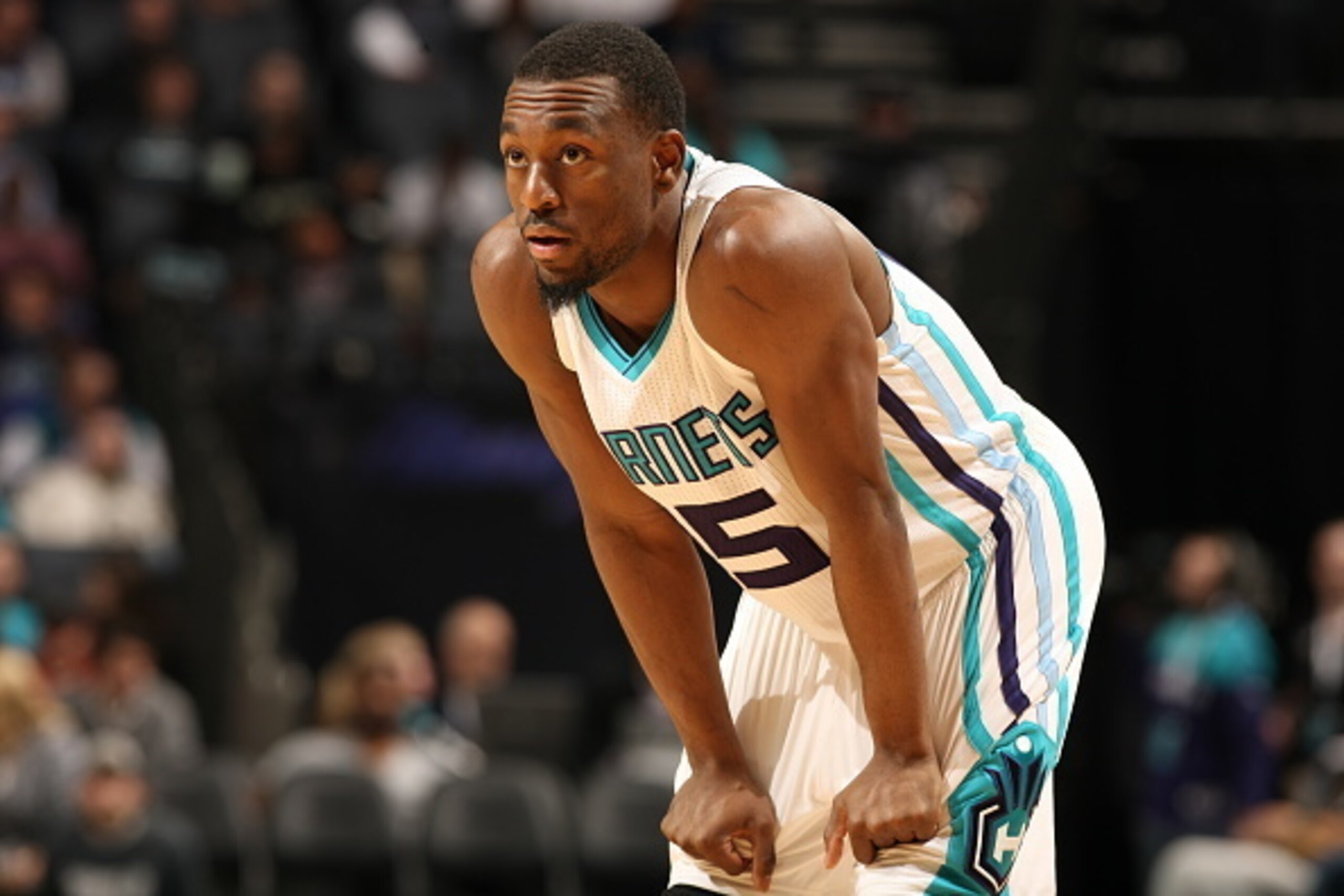 CHARLOTTE, NC - DECEMBER 17:  Kemba Walker #15 of the Charlotte Hornets stands on the court against the Phoenix Suns during the game at the Time Warner Cable Arena on December 17, 2014 in Charlotte, North Carolina. NOTE TO USER: User expressly acknowledge