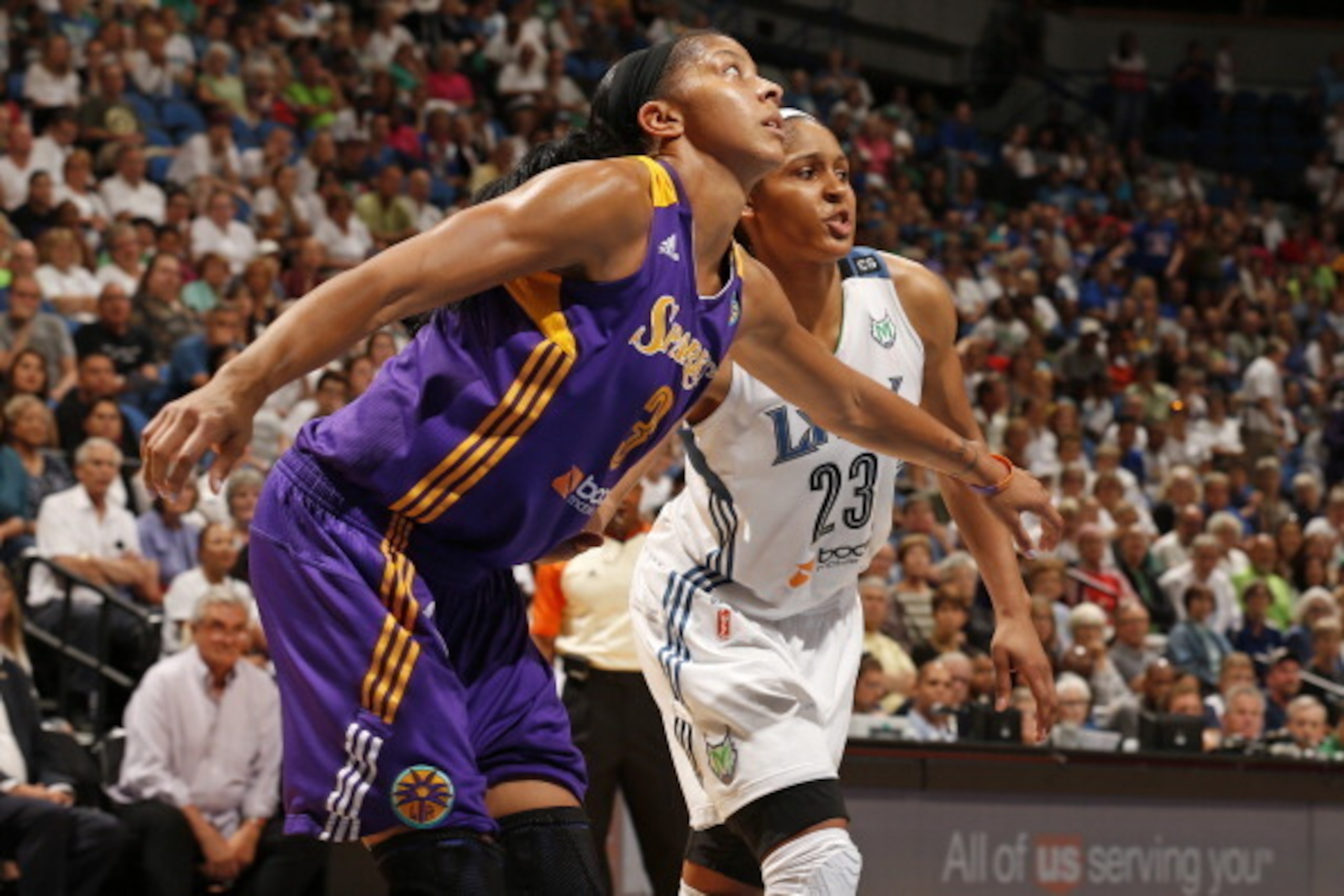 MINNEAPOLIS, MN - SEPTEMBER 4:  Candace Parker #3 of the Los Angeles Sparks looks for the rebound against Maya Moore #23 of the Minnesota Lynx during the WNBA game on September 4, 2013 at Target Center in Minneapolis, Minnesota.  NOTE TO USER: User expres