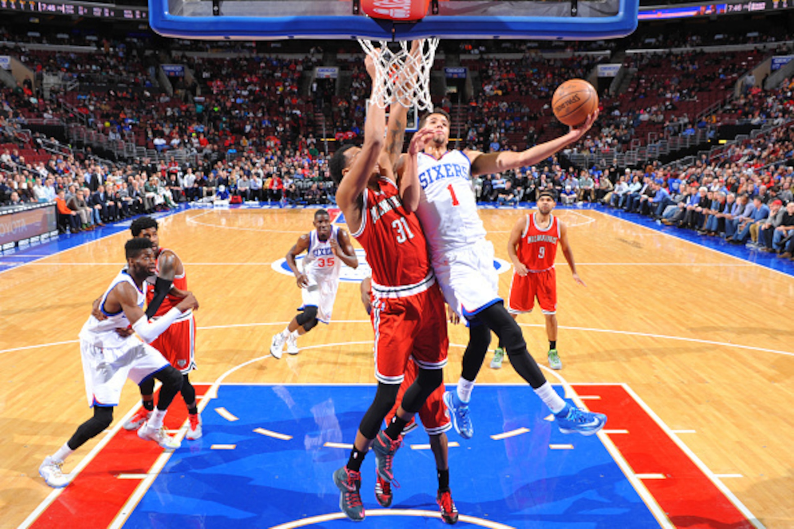 PHILADELPHIA, PA - JANUARY 7: Michael Carter-Williams #1 of the Philadelphia 76ers goes up for the layup against the Milwaukee Bucks at Wells Fargo Center on January 7, 2015 in Philadelphia, Pennsylvania NOTE TO USER: User expressly acknowledges and agre PHILADELPHIA, PA - JANUARY 7: Michael Carter-Williams #1 of the Philadelphia 76ers goes up for the layup against the Milwaukee Bucks at Wells Fargo Center on January 7, 2015 in Philadelphia, Pennsylvania NOTE TO USER: User expressly acknowledges and agre