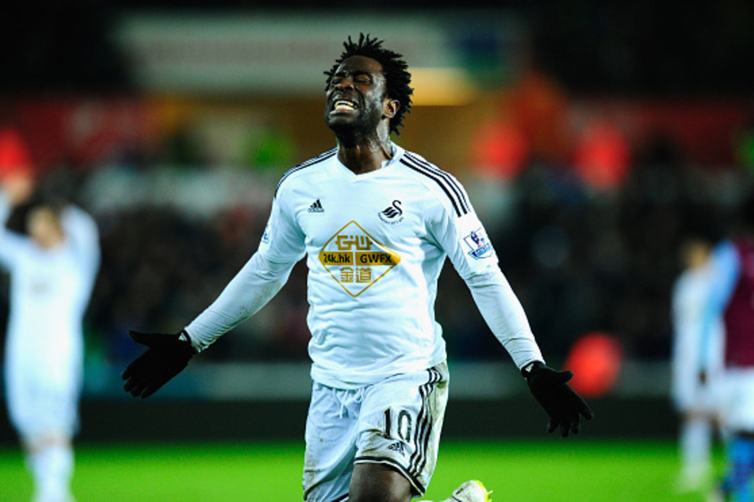 SWANSEA, WALES - DECEMBER 26:  Wilfried Bony of Swansea reacts after having a goal dissalowed during the Barclays Premier League match between Swansea City and Aston Villa at Liberty Stadium on December 26, 2014 in Swansea, Wales.  (Photo by Stu Forster/G