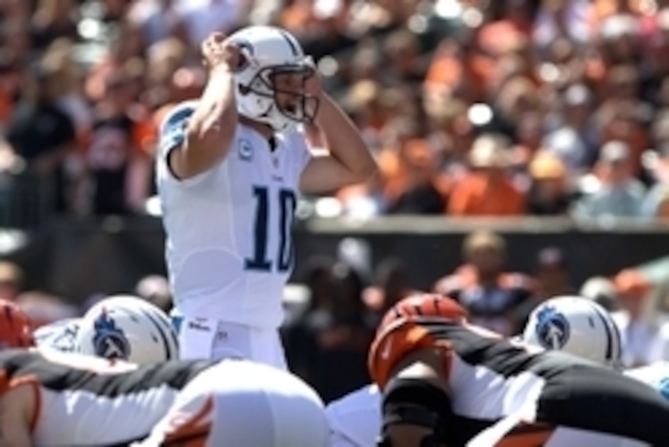 Sep 21, 2014; Cincinnati, OH, USA; Tennessee Titans quarterback Jake Locker (10) against the Cincinnati Bengals at Paul Brown Stadium. The Bengals won 33-7. Mandatory Credit: Aaron Doster-USA TODAY Sports