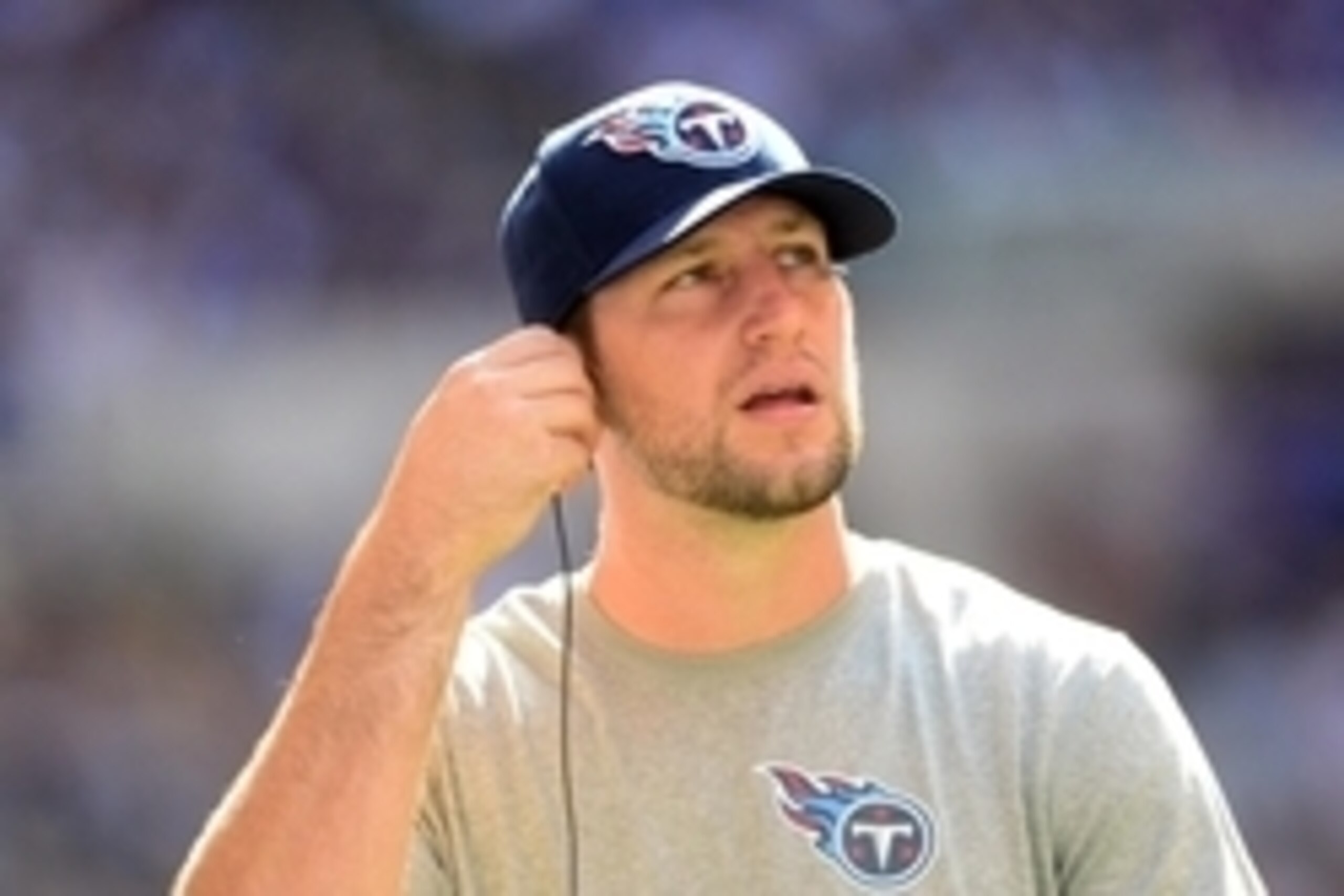 Sep 28, 2014; Indianapolis, IN, USA; Tennessee Titans quarterback Jake Locker (10) on the sidelines during the third quarter against the Indianapolis Colts at Lucas Oil Stadium. Mandatory Credit: Andrew Weber-USA TODAY Sports