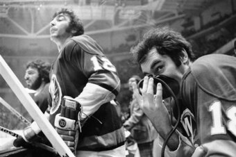 Parise (12) and Ed Westfall (18) were veterans on a young team.