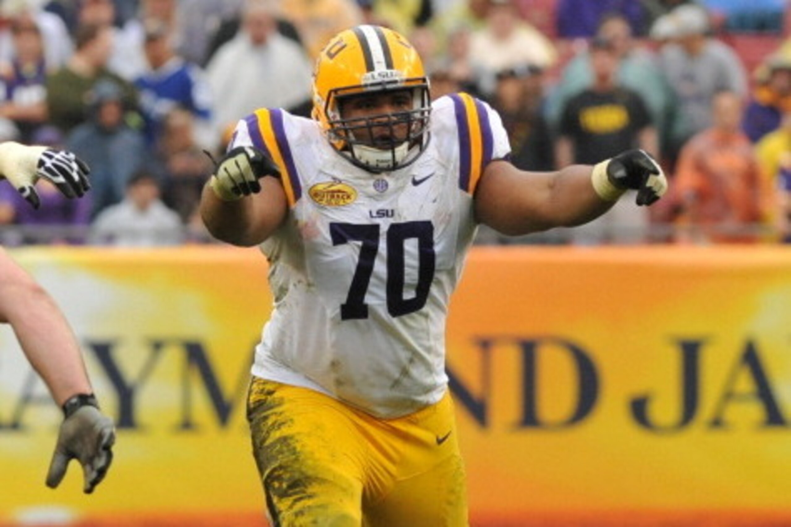 TAMPA, FL - JANUARY 1: Tackle Lael Collins #70 of the LSU Tigers sets for play against the Iowa Hawkeyes January 1, 2014 in the Outback Bowl at Raymond James Stadium in Tampa, Florida. LSU won 21 - 14. (Photo by Al Messerschmidt/Getty Images) TAMPA, FL - JANUARY 1: Tackle Lael Collins #70 of the LSU Tigers sets for play against the Iowa Hawkeyes January 1, 2014 in the Outback Bowl at Raymond James Stadium in Tampa, Florida. LSU won 21 - 14. (Photo by Al Messerschmidt/Getty Images)