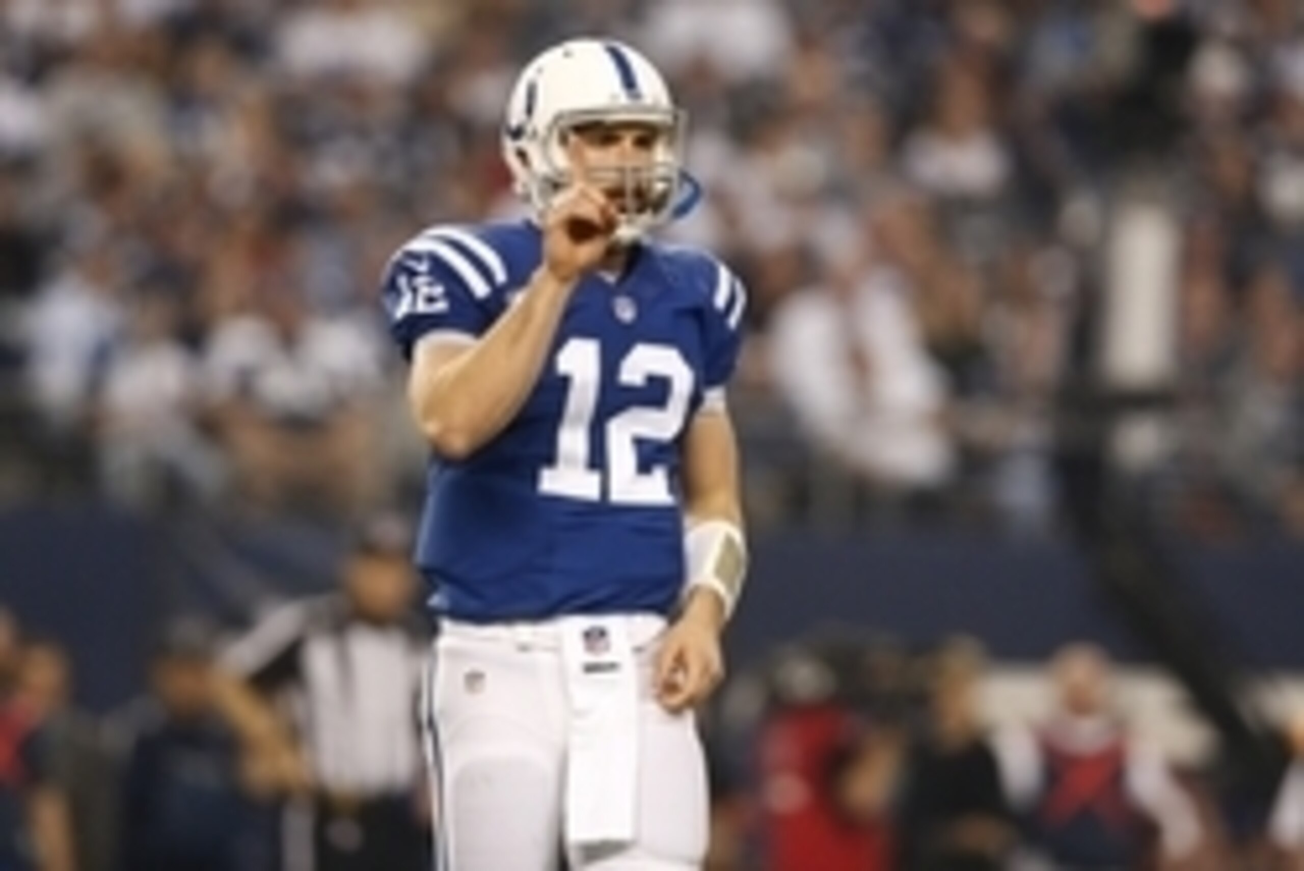 Dec 21, 2014; Arlington, TX, USA; Indianapolis Colts quarterback Andrew Luck (12) signals number one back to the sidelines against the Dallas Cowboys at AT&T Stadium. Mandatory Credit: Matthew Emmons-USA TODAY Sports Dec 21, 2014; Arlington, TX, USA; Indianapolis Colts quarterback Andrew Luck (12) signals number one back to the sidelines against the Dallas Cowboys at AT&T Stadium. Mandatory Credit: Matthew Emmons-USA TODAY Sports