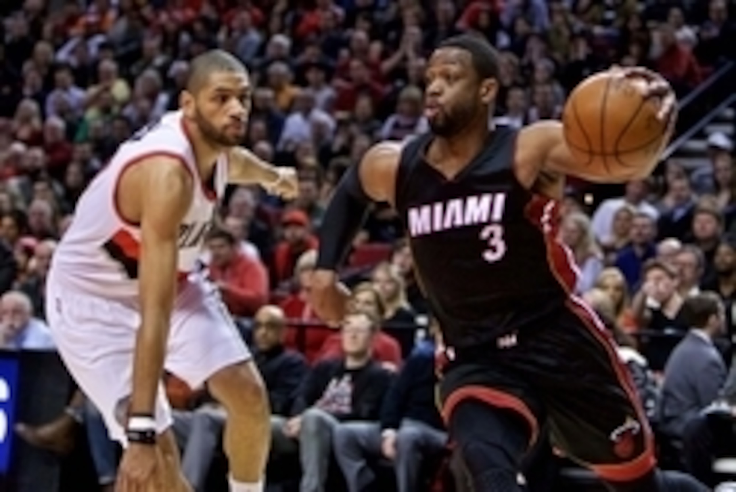 Jan 8, 2015; Portland, OR, USA; Miami Heat guard Dwyane Wade (3) drives past Portland Trail Blazers forward Nicolas Batum (88) during the first quarter at the Moda Center. Mandatory Credit: Craig Mitchelldyer-USA TODAY Sports Jan 8, 2015; Portland, OR, USA; Miami Heat guard Dwyane Wade (3) drives past Portland Trail Blazers forward Nicolas Batum (88) during the first quarter at the Moda Center. Mandatory Credit: Craig Mitchelldyer-USA TODAY Sports