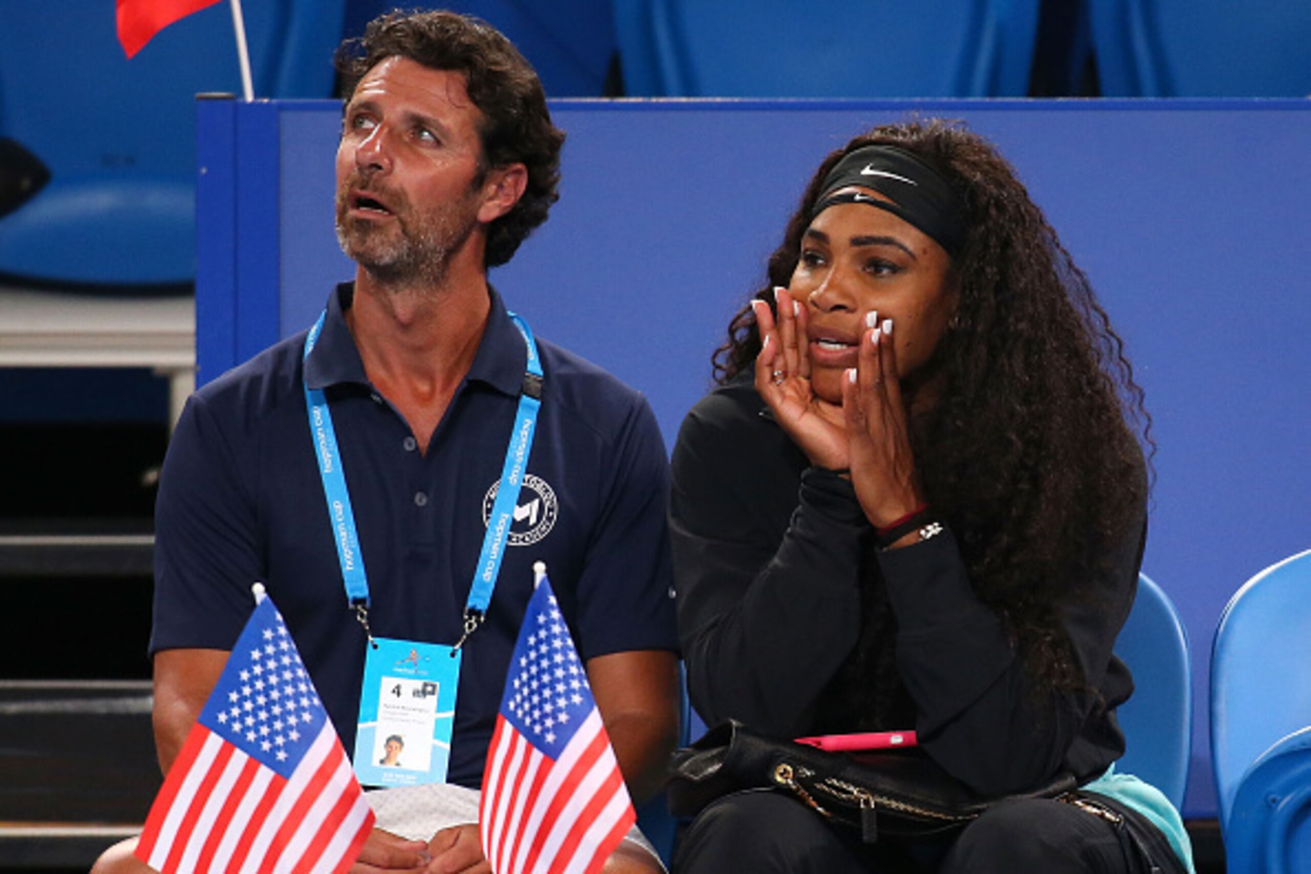 PERTH, AUSTRALIA - JANUARY 05: Patrick Mouratoglou and Serena Williams of the United States watch the singles match between John Isner of the United States and Fabio Fognini of Italy during day two of the 2015 Hopman Cup at Perth Arena on January 5, 2015 