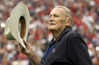 HOUSTON, TX - JANUARY 07:  Bum Phillips, the former head coach and general manager of the Houston Oilers football team and father of Houston Texans defensive coordinator Wade Phillips, is honored on the field before the Texans take on the Cincinnati Benga