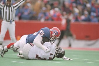 12 Nov 1995:  Linebacker Bryce Paup of the Buffalo Bills sacks Indianapolis Colts quarterback Jeff George during a game at Rich Stadium in Orchard Park, New York.  The Bills won the game, 23-17. Mandatory Credit: Rick Stewart  /Allsport