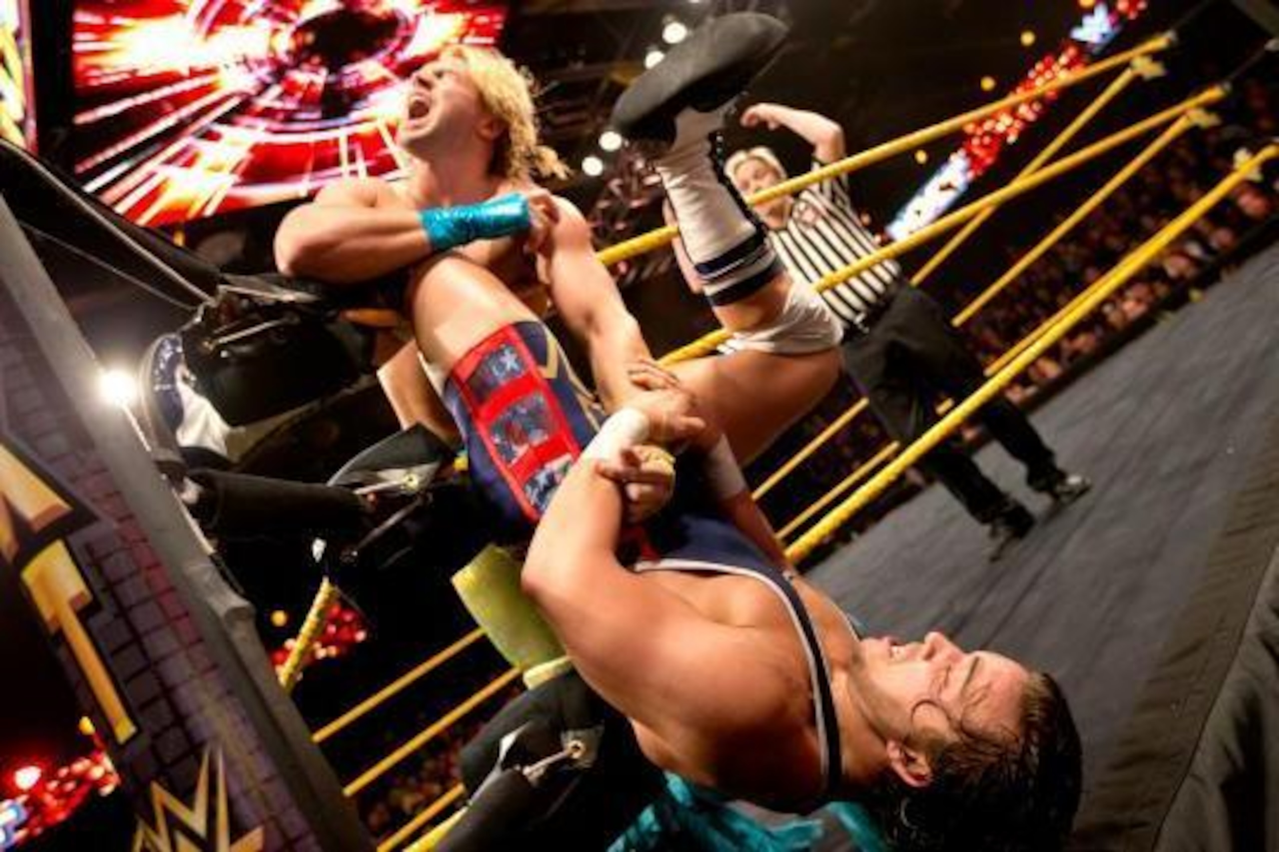 Chad Gable locks up Tyler Breeze in the ropes.