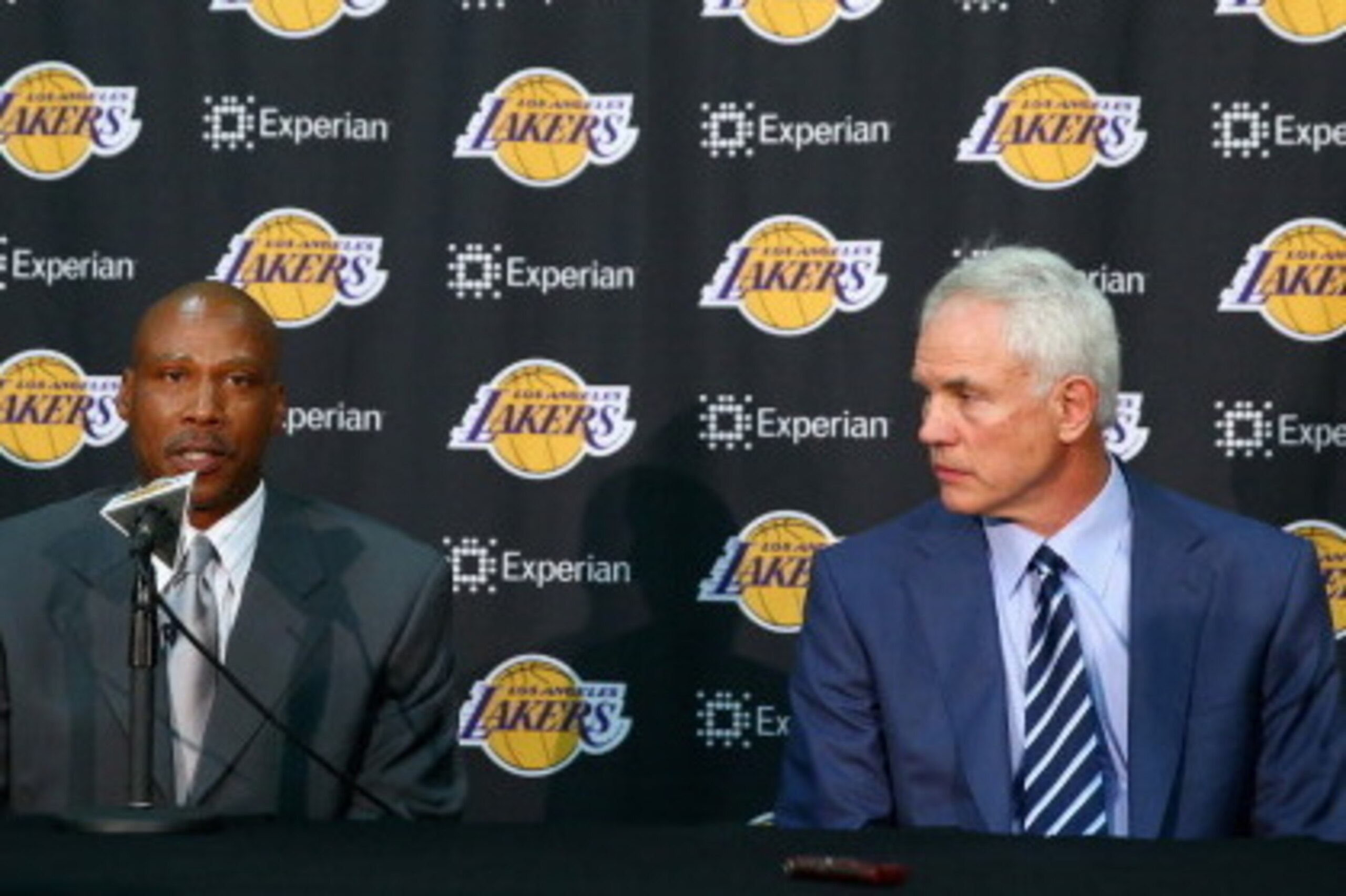 EL SEGUNDO, CA - JULY 29:  Byron Scott addresses the media, as Los Angeles Lakers general manager Mitch Kupchak looks on during a press conference to introduce Byron Scott as the new head coach of the Los Angeles Lakers at Toyota Sports Center on July 29,