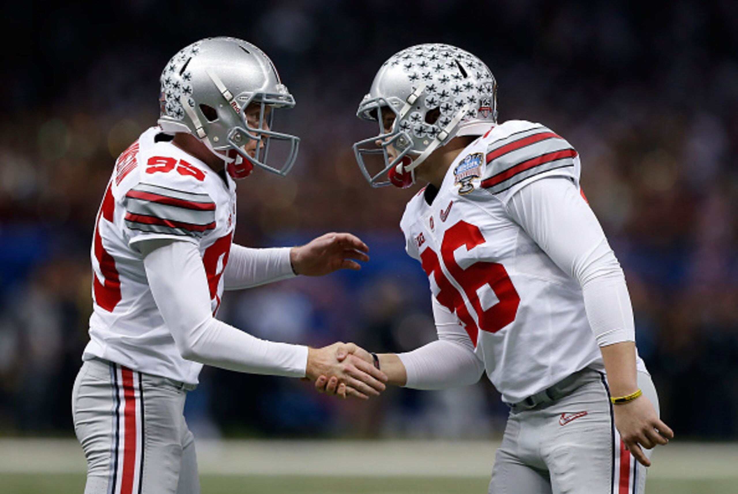 NEW ORLEANS, LA - JANUARY 01:  Cameron Johnston #95 and Sean Nuernberger #96 of the Ohio State Buckeyes shake hands after a field goal against the Alabama Crimson Tide during the All State Sugar Bowl at the Mercedes-Benz Superdome on January 1, 2015 in Ne