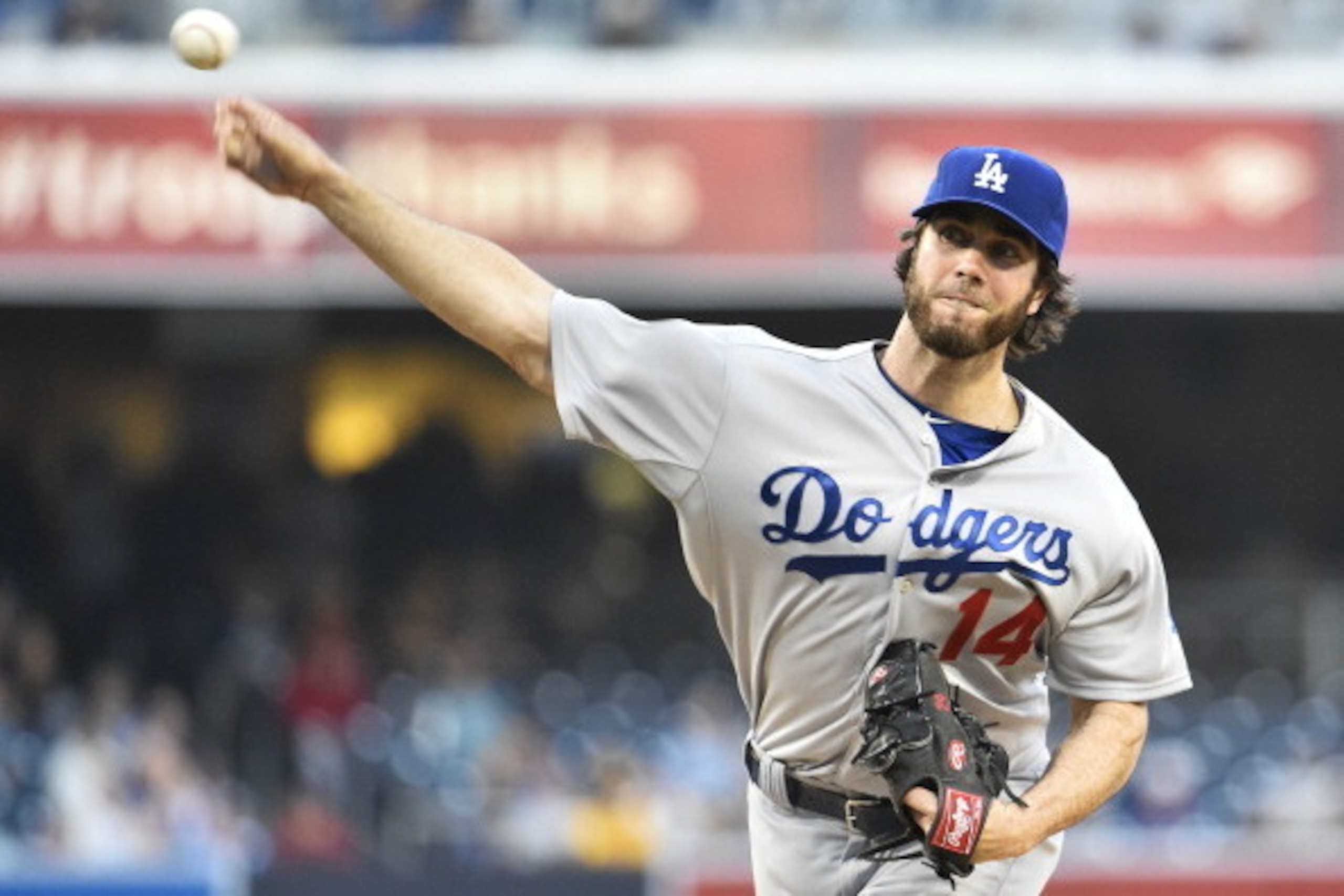 SAN DIEGO, CA - JUNE 20:  Dan Haren #14 of the Los Angeles Dodgers pitches during the first inning of a baseball game against the San Diego Padres at Petco Park June 20, 2014 in San Diego, California.  (Photo by Denis Poroy/Getty Images)