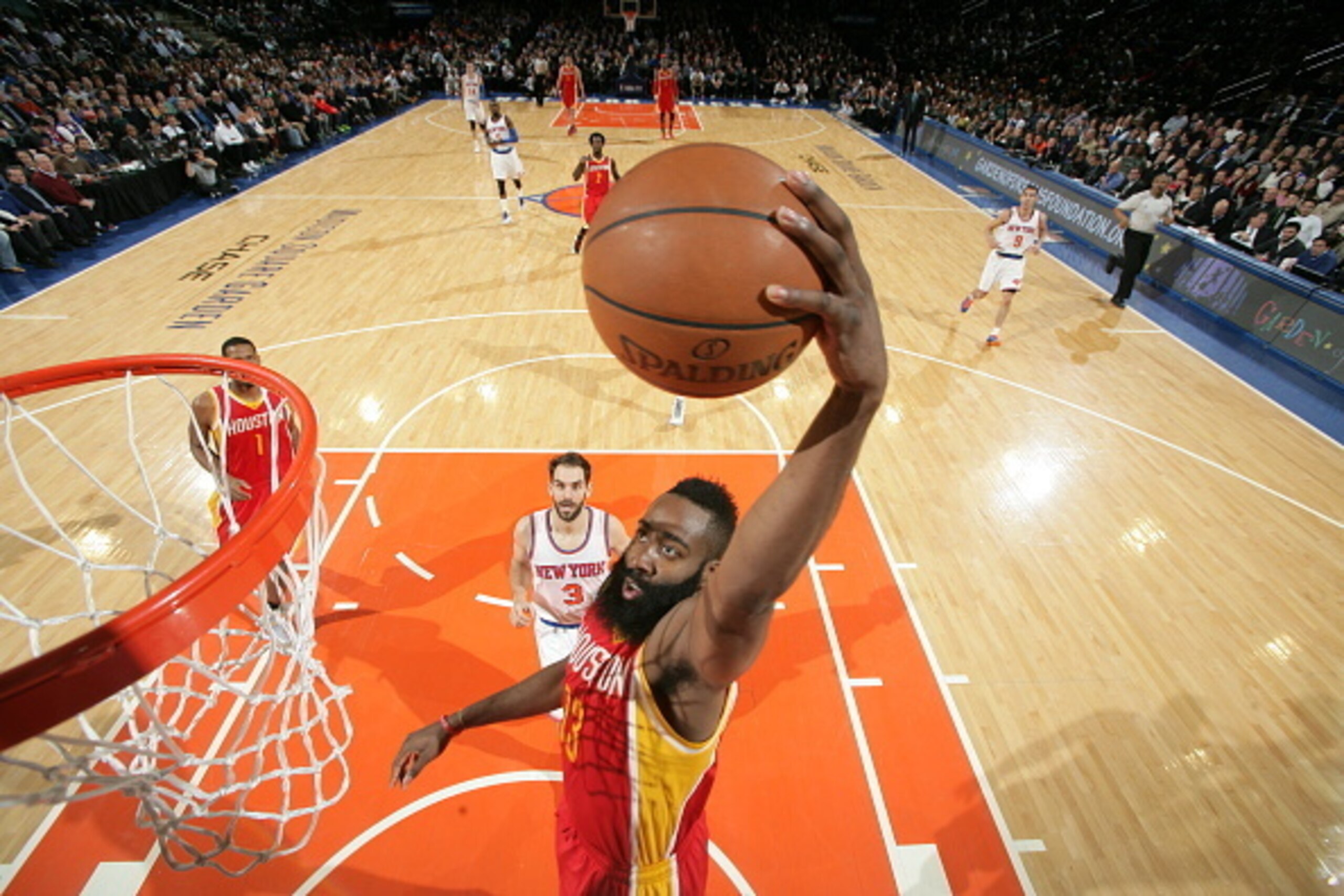 NEW YORK, NY - JANUARY 8:  James Harden #13 of the Houston Rockets goes to the basket against the New York Knicks on January 8, 2015 at Madison Square Garden in New York City.  NOTE TO USER: User expressly acknowledges and agrees that, by downloading and 