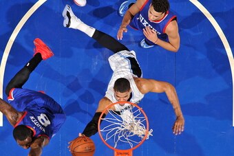 ORLANDO, FL - December 21: Tobias Harris #12 of the Orlando Magic shoots against the Philadelphia 76ers on December 21, 2014 at Amway Center in Orlando, Florida. NOTE TO USER: User expressly acknowledges and agrees that, by downloading and or using this P