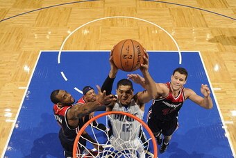 ORLANDO, FL - DECEMBER 10:  Tobias Harris #12 of the Orlando Magic goes up for a dunk against the Washington Wizards during the game on December 10, 2014 at Amway Center in Orlando, Florida. NOTE TO USER: User expressly acknowledges and agrees that, by do
