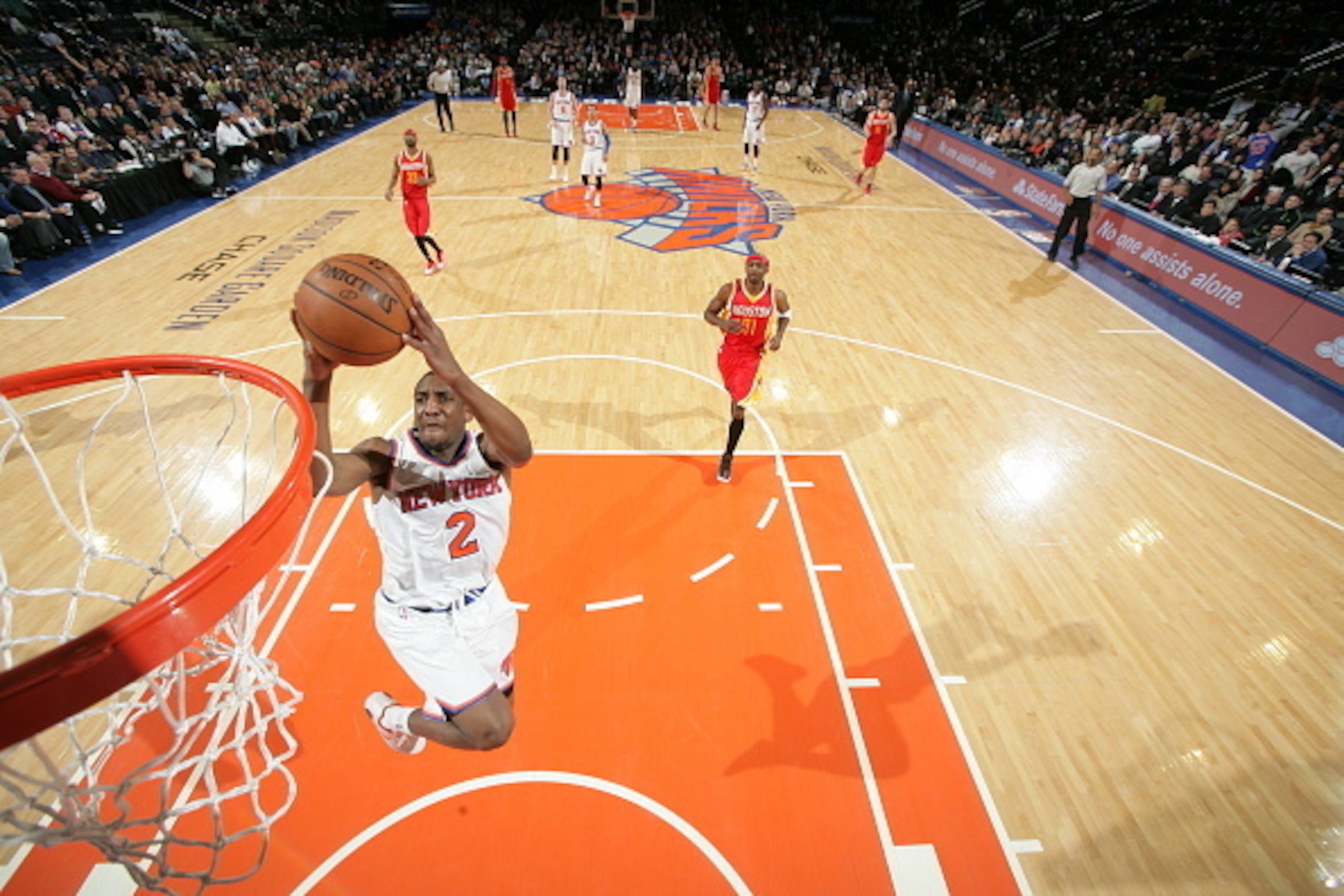 NEW YORK, NY - JANUARY 8:  Langston Galloway #2 of the New York Knicks dunks against the Houston Rockets on January 8, 2015 at Madison Square Garden in New York City.  NOTE TO USER: User expressly acknowledges and agrees that, by downloading and or using 