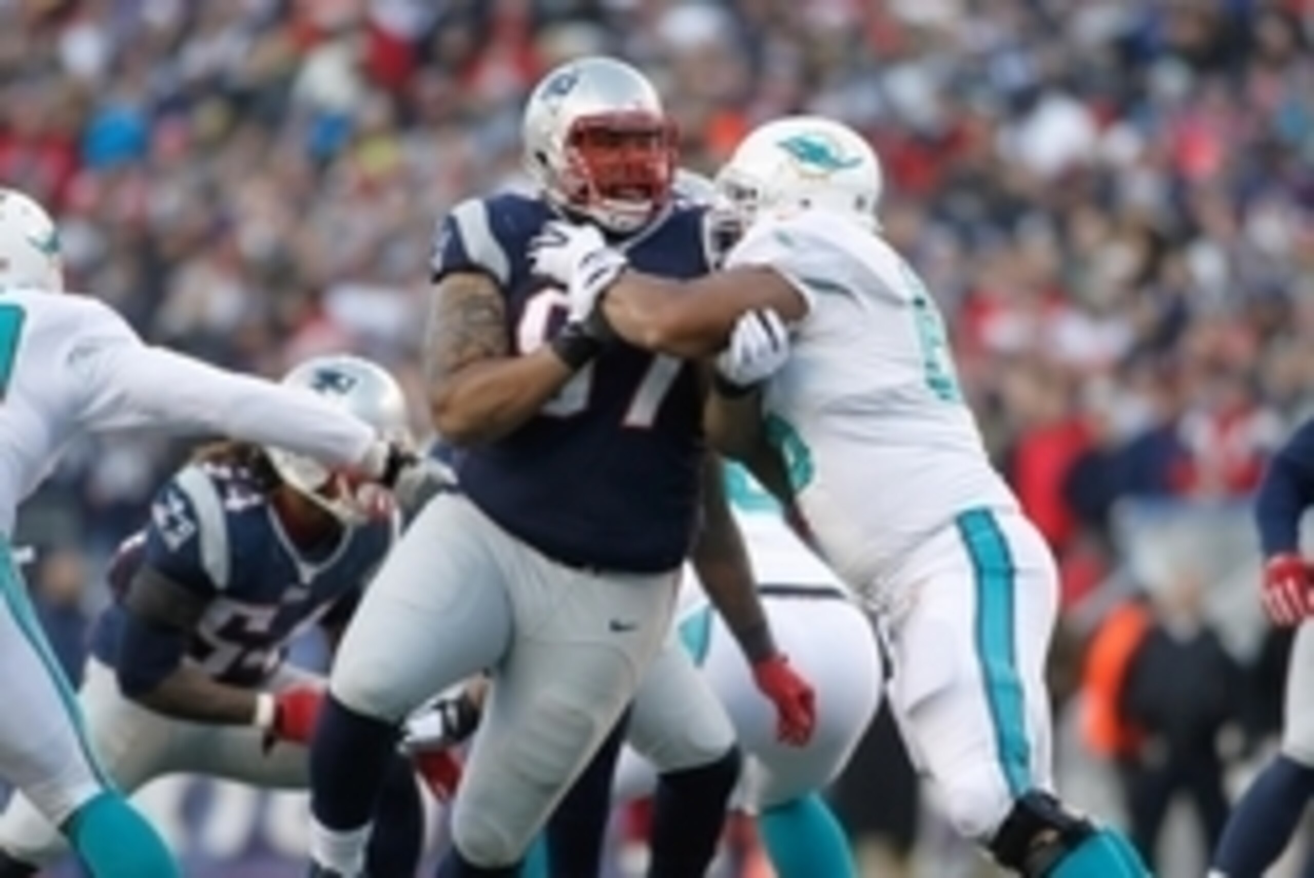 Dec 14, 2014; Foxborough, MA, USA; Miami Dolphins offensive guard Shelley Smith (66) blocks New England Patriots defensive tackle Alan Branch (97) during the third quarter at Gillette Stadium. New England defeated Miami 41-13. Mandatory Credit: Stew Milne