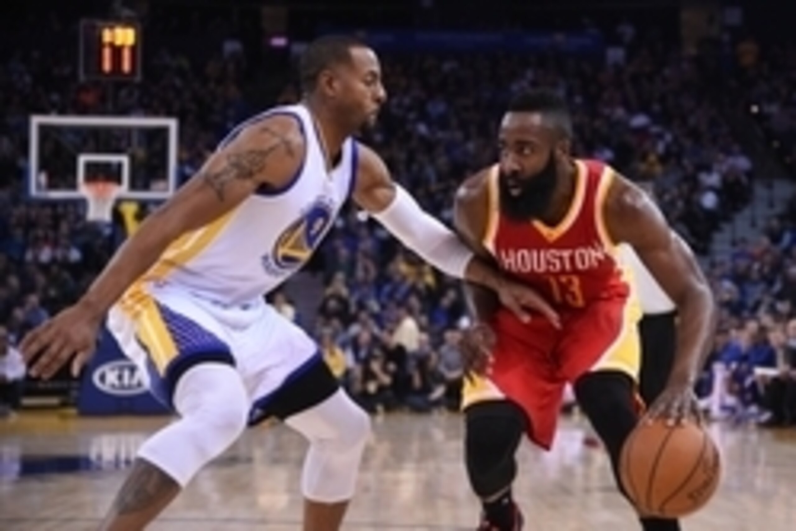 December 10, 2014; Oakland, CA, USA; Houston Rockets guard James Harden (13) dribbles the basketball against Golden State Warriors guard Andre Iguodala (9) during the first quarter at Oracle Arena. Mandatory Credit: Kyle Terada-USA TODAY Sports