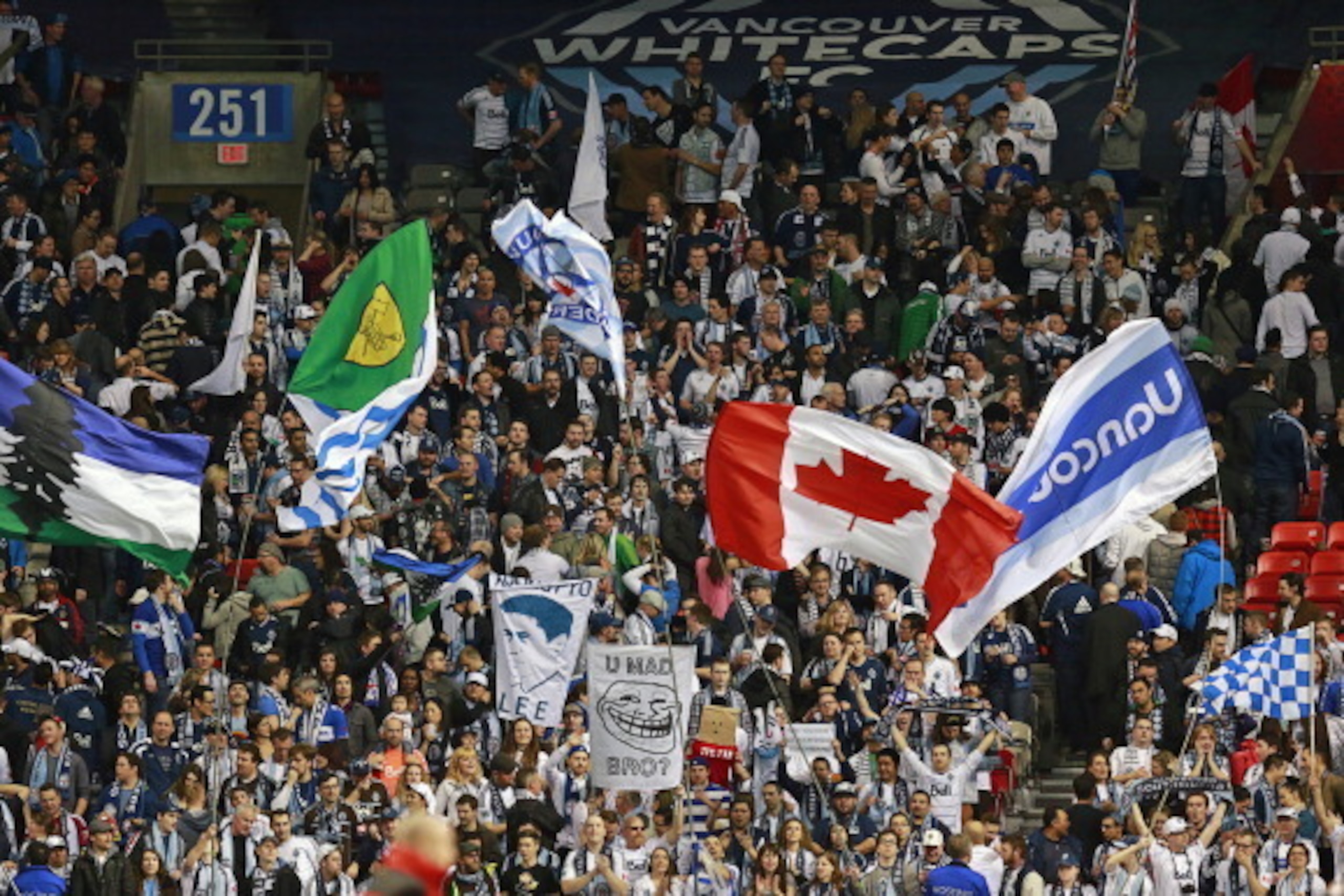 VANCOUVER, CANADA - MARCH 2:  Vancouver Whitecap fans wave flags during the MLS game between Toronto FC and the Vancouver Whitecaps March 2, 2013 at B.C. Place in Vancouver, British Columbia, Canada. (Photo by Jeff Vinnick/Getty Images)