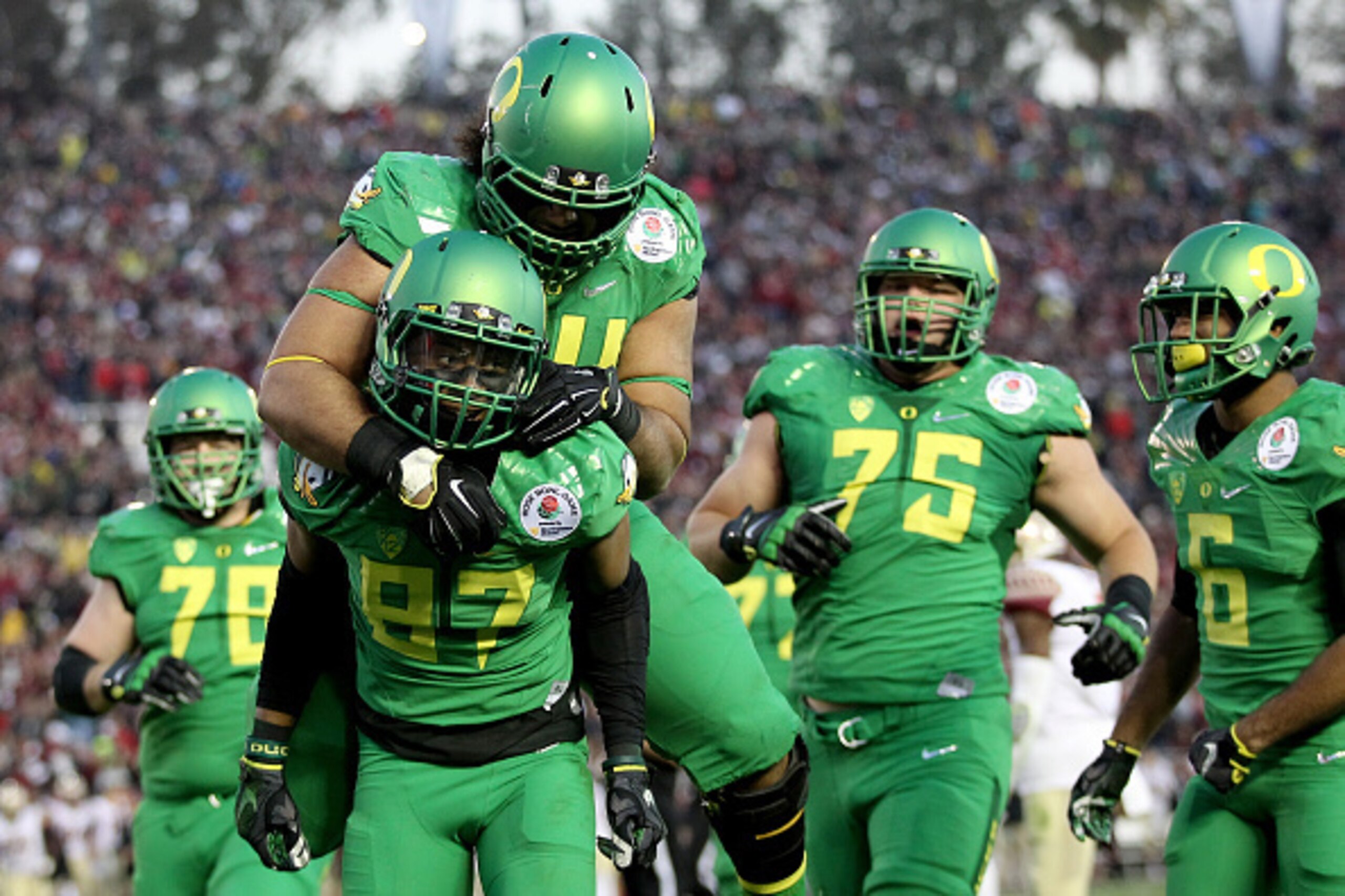 PASADENA, CA - JANUARY 01:  Wide receiver Darren Carrington #87 of the Oregon Ducks celebrates after a 30-yard touchdown against the Florida State Seminoles in the third quarter of the College Football Playoff Semifinal at the Rose Bowl Game presented by 