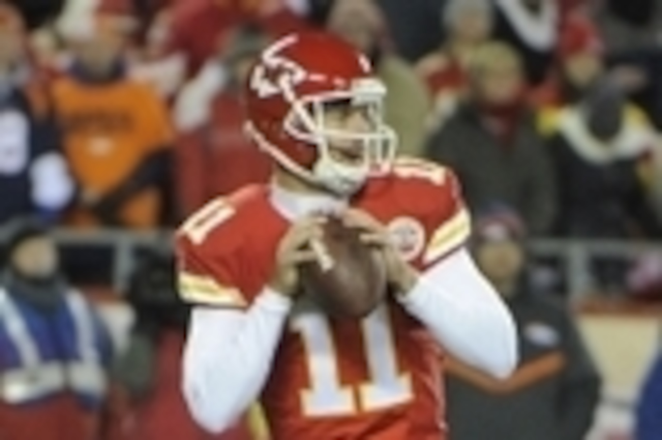 Nov 30, 2014; Kansas City, MO, USA; Kansas City Chiefs quarterback Alex Smith (11) drops back to pass against the Denver Broncos in the first half at Arrowhead Stadium. Mandatory Credit: John Rieger-USA TODAY Sports