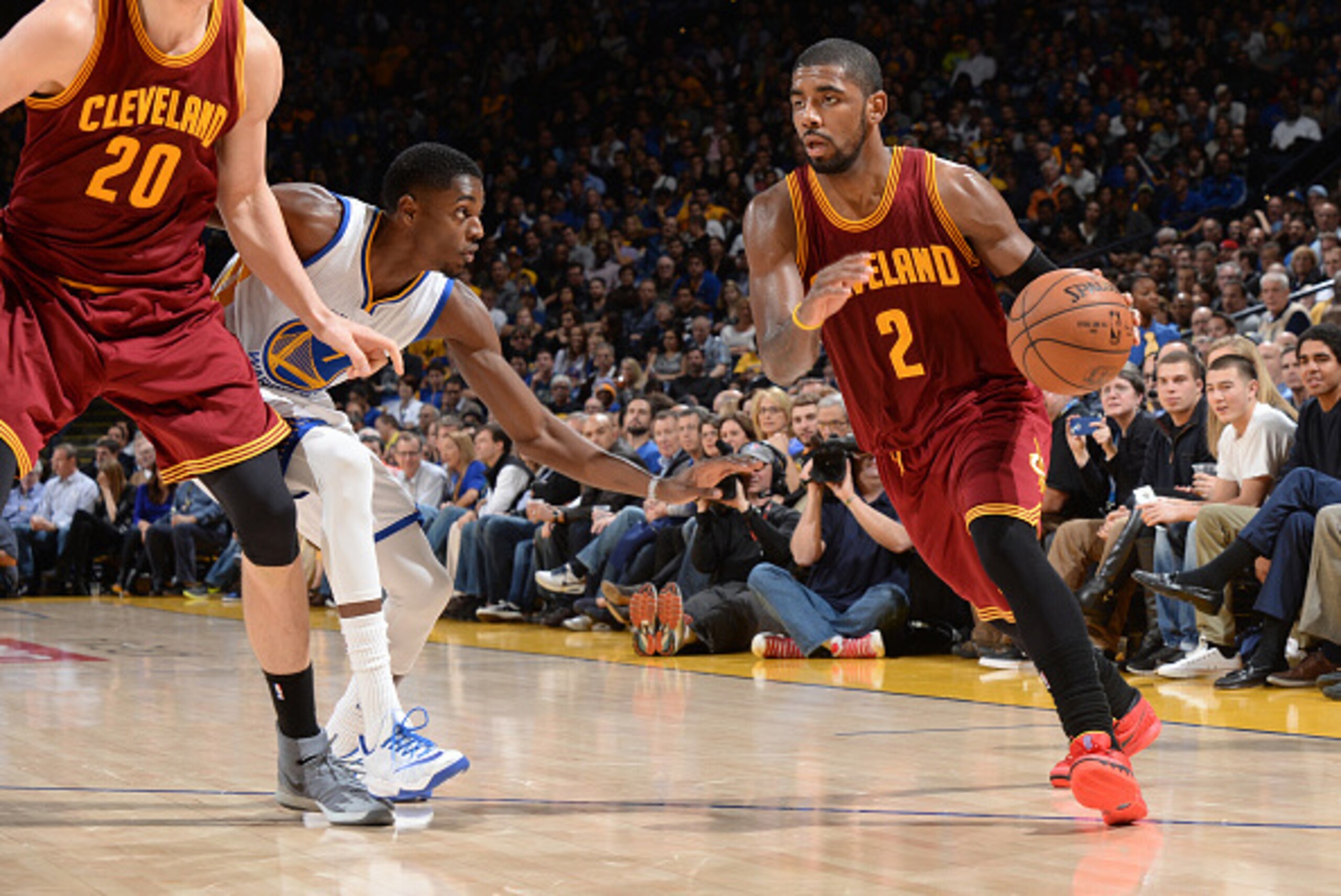 OAKLAND, CA - JANUARY 9: Kyrie Irving #2 of the Cleveland Cavaliers handles the ball against the Golden State Warriors on January 9, 2015 at Oracle Arena in Oakland, California. NOTE TO USER: User expressly acknowledges and agrees that, by downloading and
