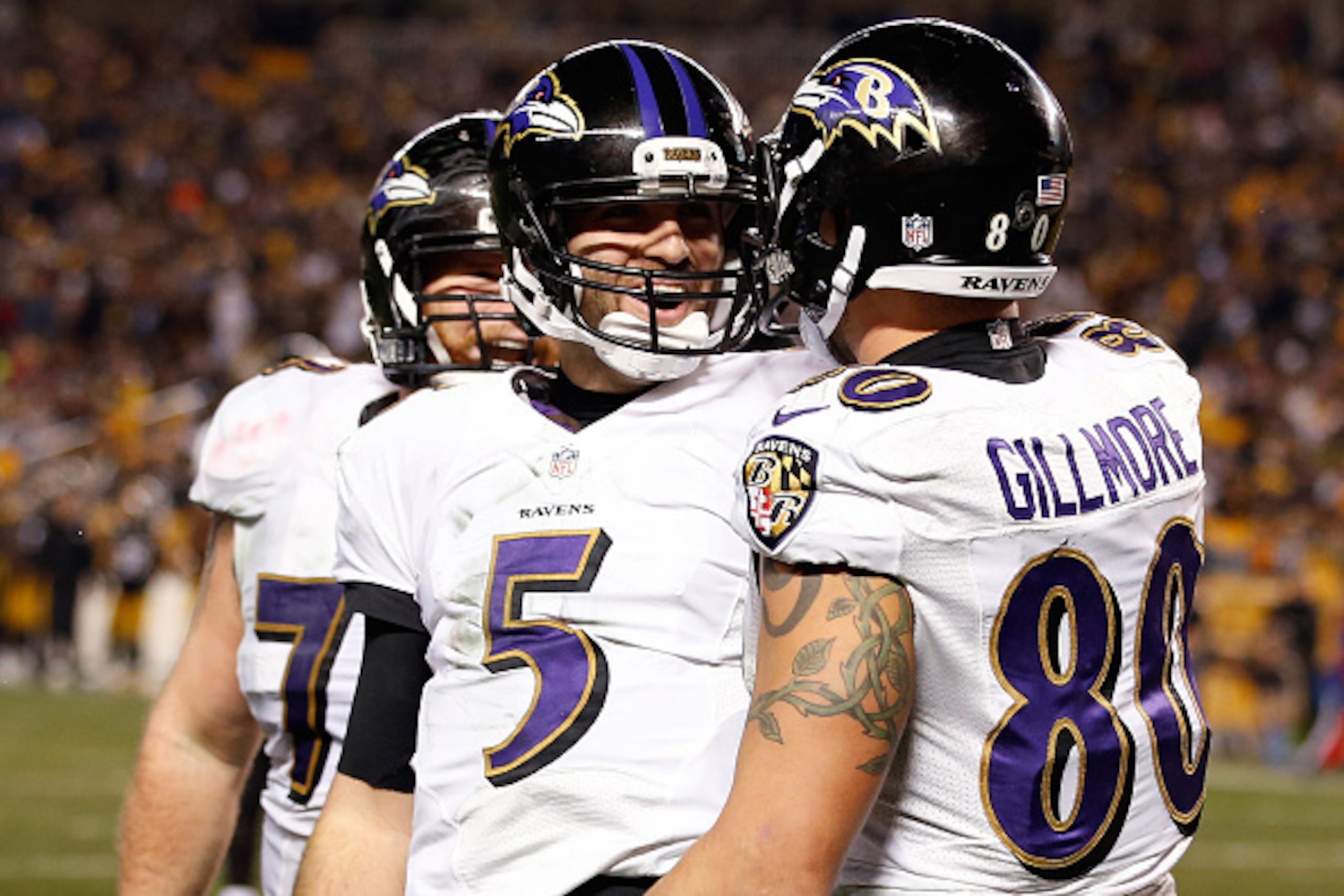 PITTSBURGH, PA - JANUARY 03:  Crockett Gillmore #80 celebrates a fourth quarter touchdown with Joe Flacco #5 of the Baltimore Ravens against the Pittsburgh Steelers during their AFC Wild Card game at Heinz Field on January 3, 2015 in Pittsburgh, Pennsylva