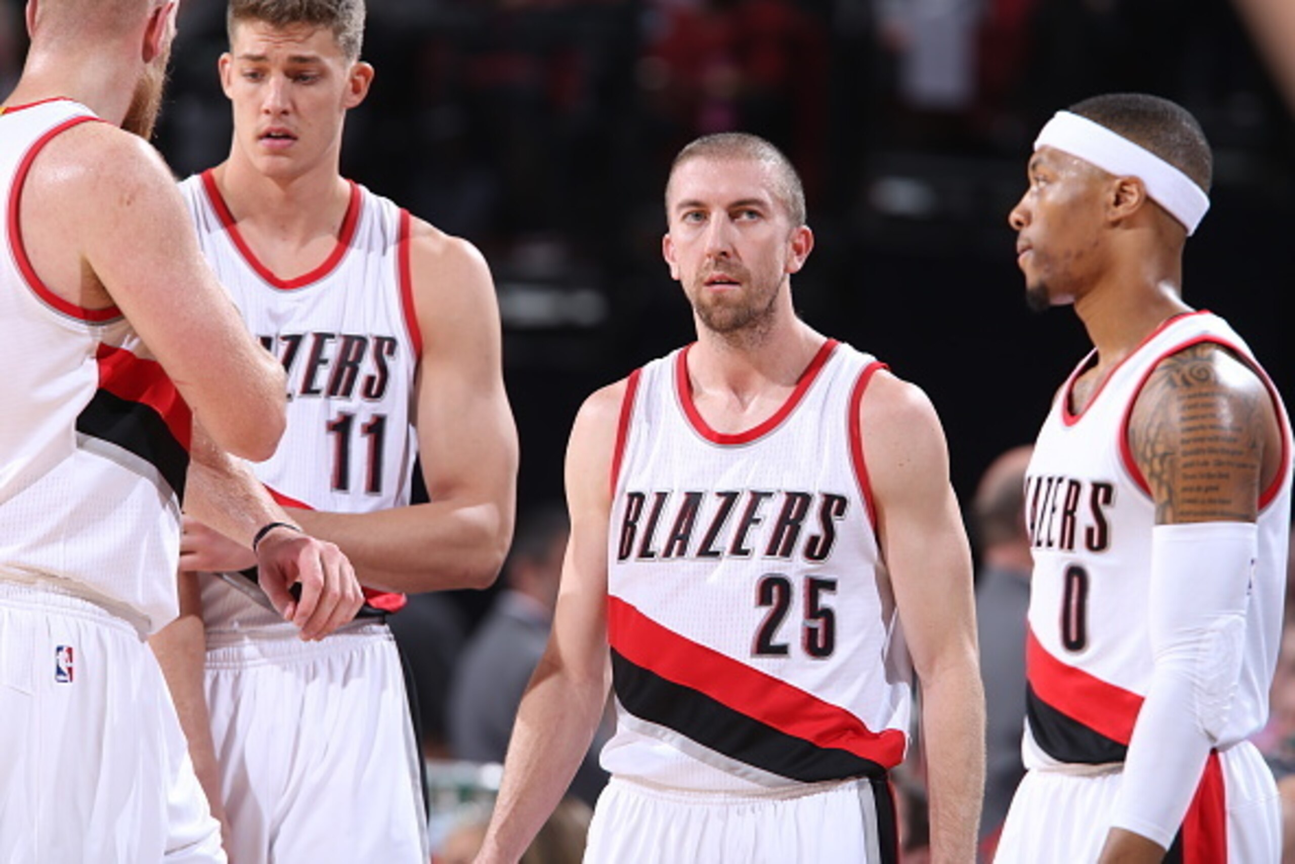 PORTLAND, OR - JANUARY 8:  Steve Blake #25 of the Portland Trail Blazers stands on the court with teammates during the game against the Miami Heat on January 8, 2015 at the Moda Center Arena in Portland, Oregon. NOTE TO USER: User expressly acknowledges a