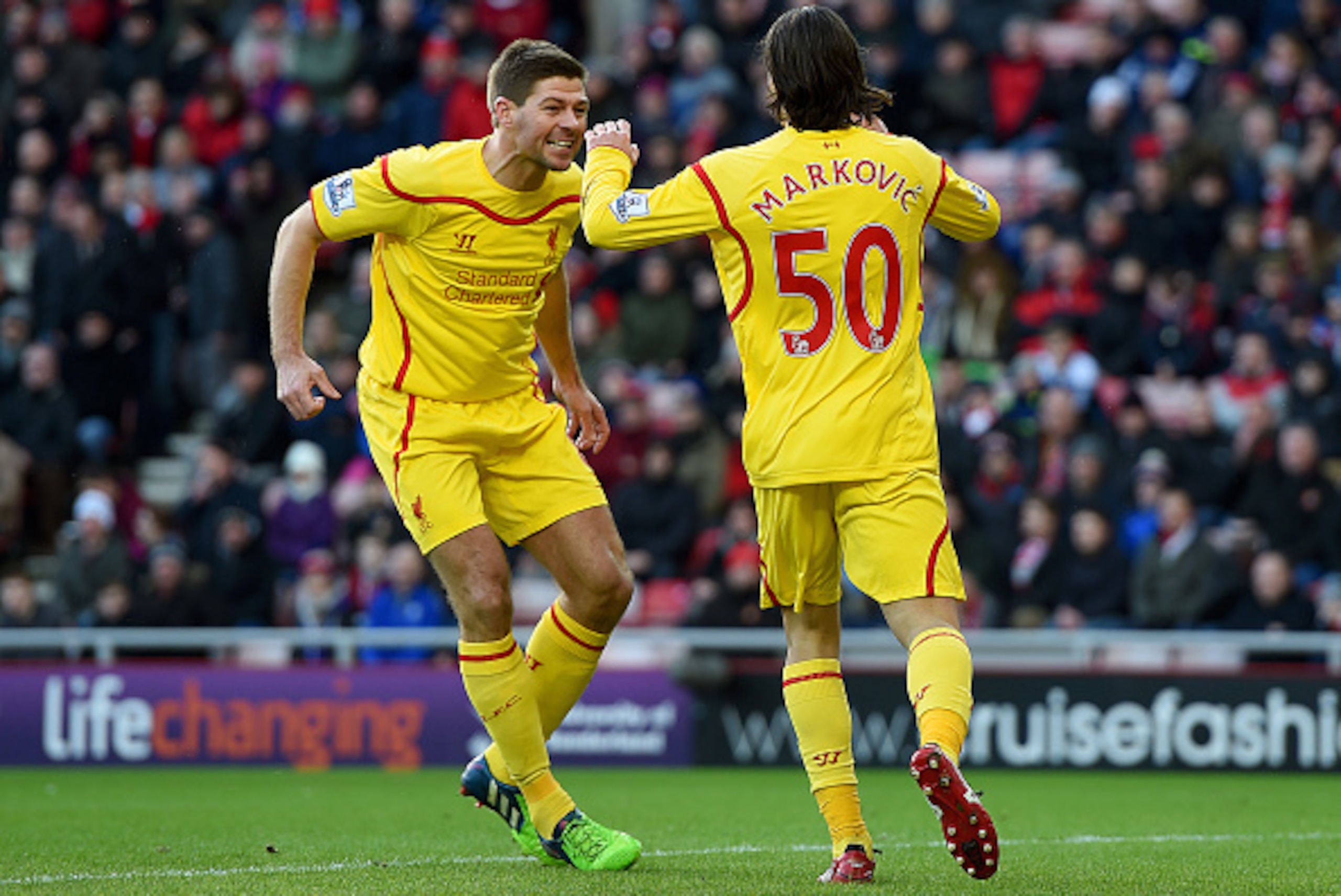 SUNDERLAND, ENGLAND - JANUARY 10:  Lazar Markovic of Liverpool celebrates scoring the opening goal with Steven Gerrard during the Barclays Premier League match between Sunderland and Liverpool at Stadium of Light on January 10, 2015 in Sunderland, England