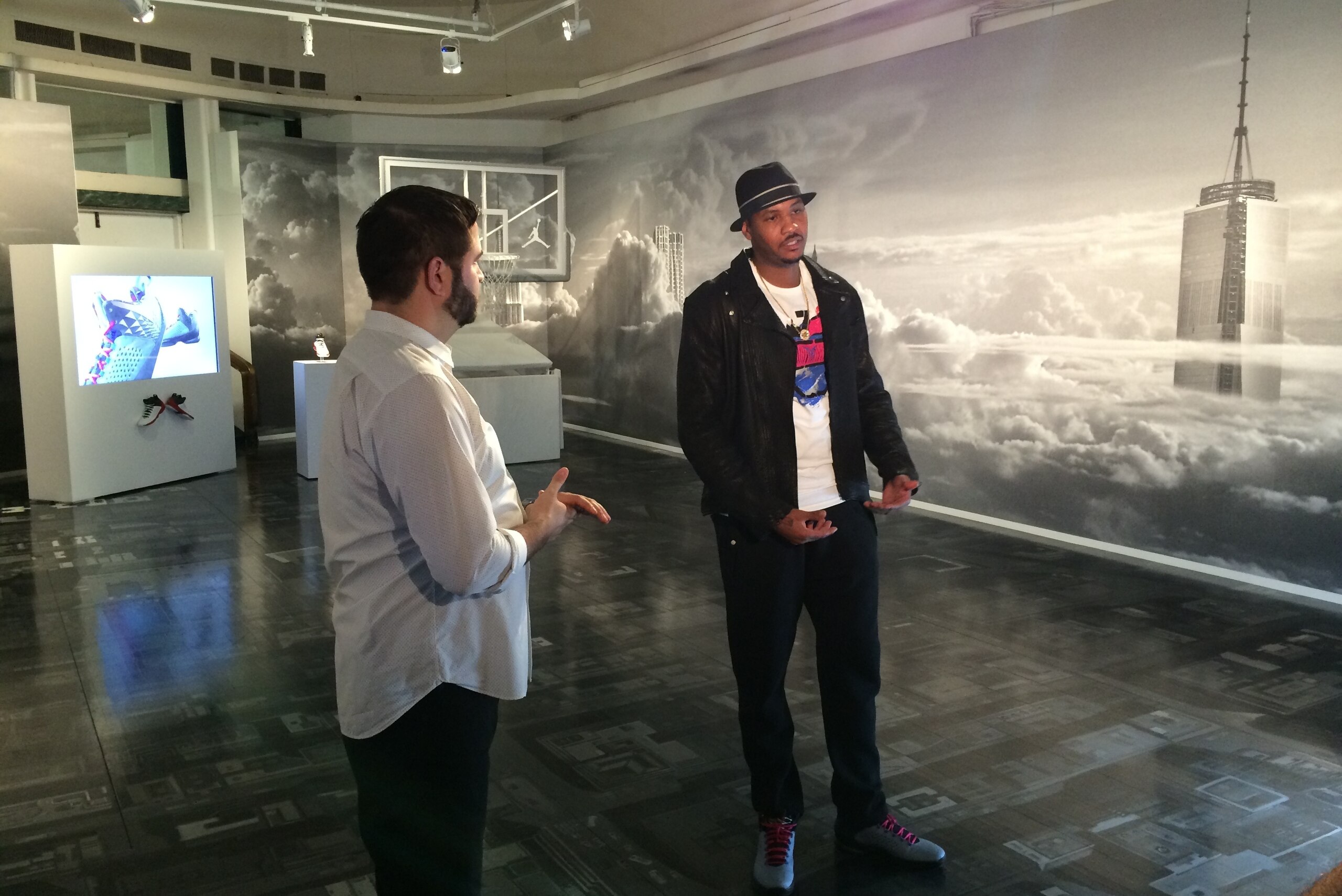 Carmelo Anthony as art curator inside his customized Jordan Brand Terminal 23 gym, with the artistic backdrop of New York City all around him.
