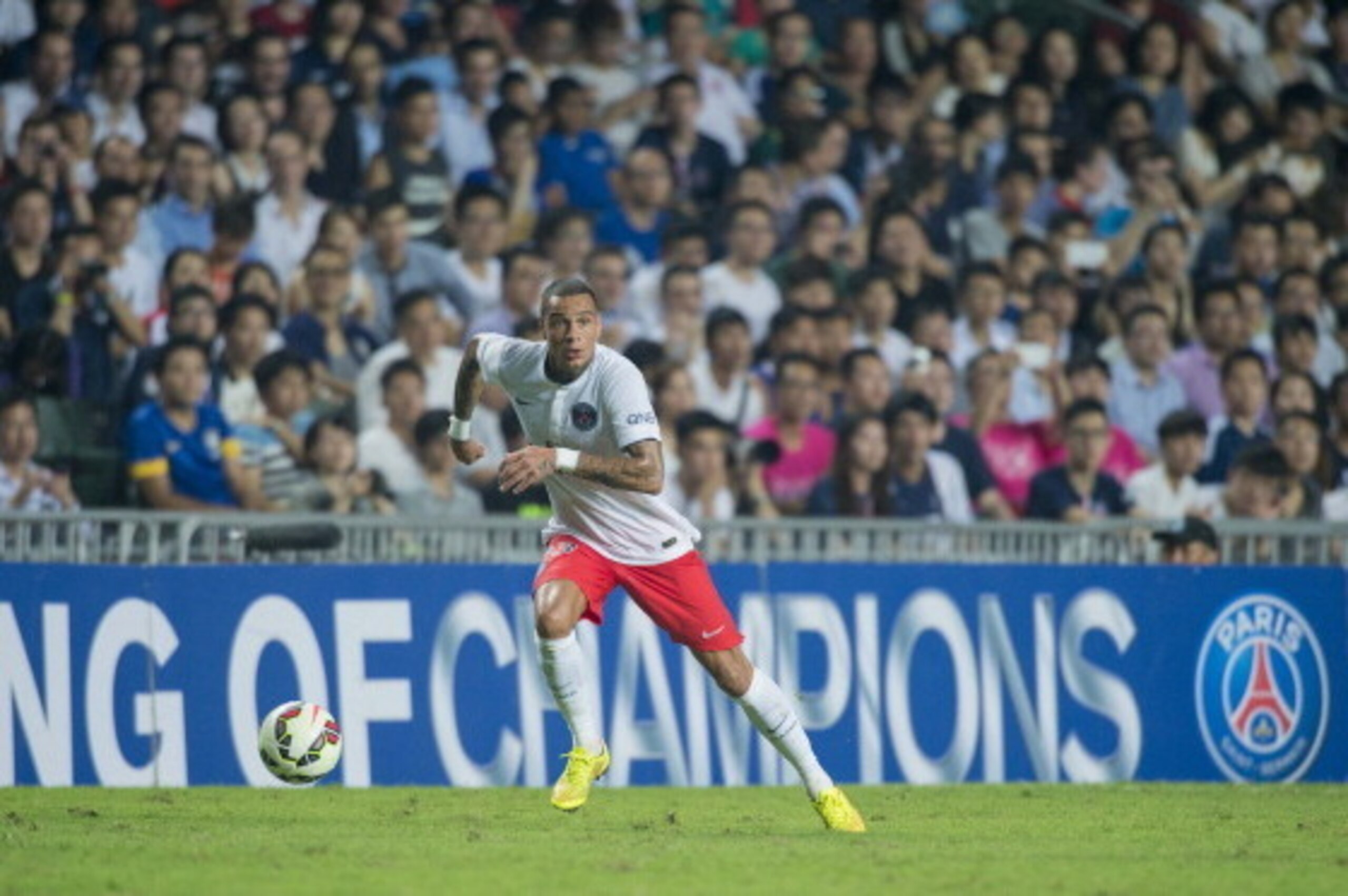 HONG KONG - JULY 29:  Gregory Van der Wiel of Paris Saint-Germain in action during the friendly match between Kitchee and Paris Saint-Germain at Hong Kong Stadium on July 29, 2014 in Hong Kong, Hong Kong.  (Photo by Victor Fraile/Getty Images)