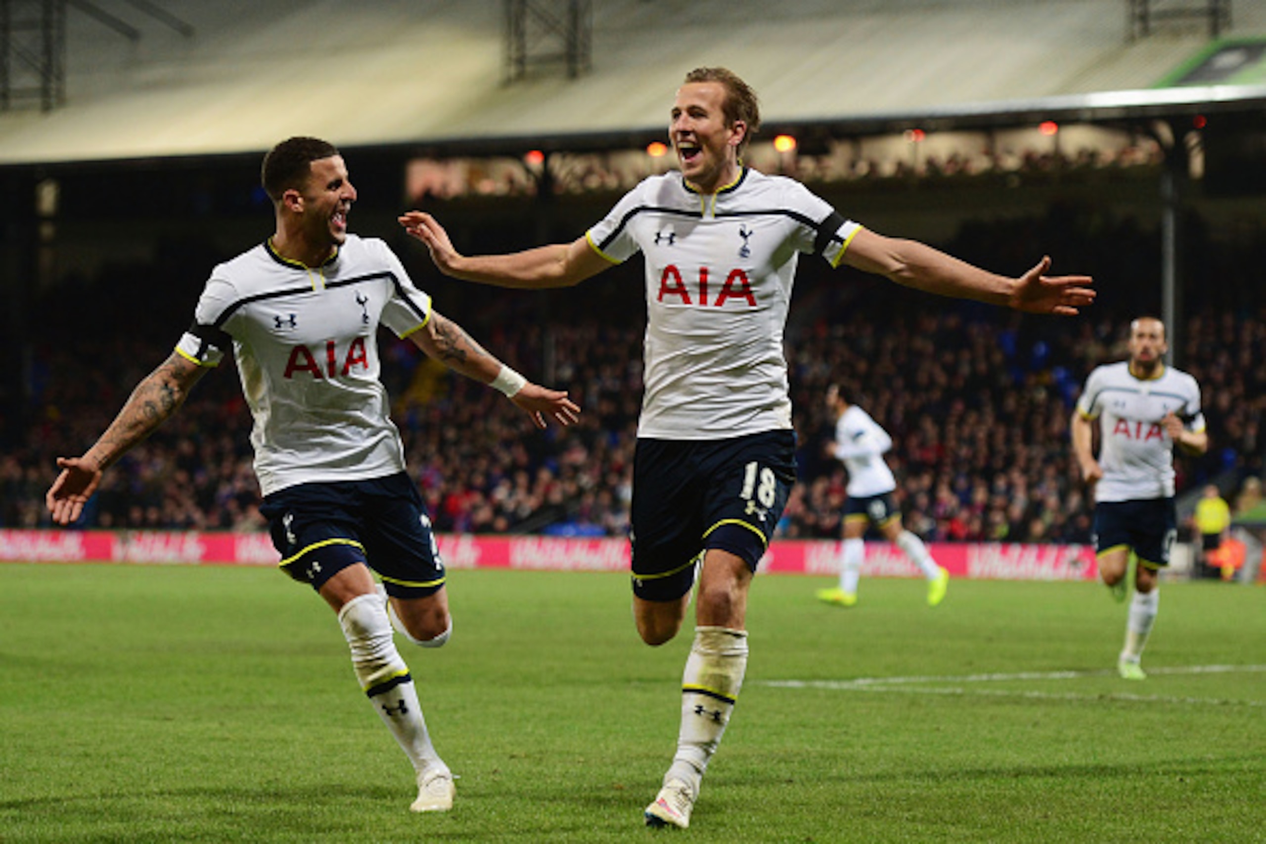 LONDON, ENGLAND - JANUARY 10:  Harry Kane of Spurs (18) celebrates with Kyle Walker as he scores their first goal during the Barclays Premier League match between Crystal Palace and Tottenham Hotspur at Selhurst Park on January 10, 2015 in London, England