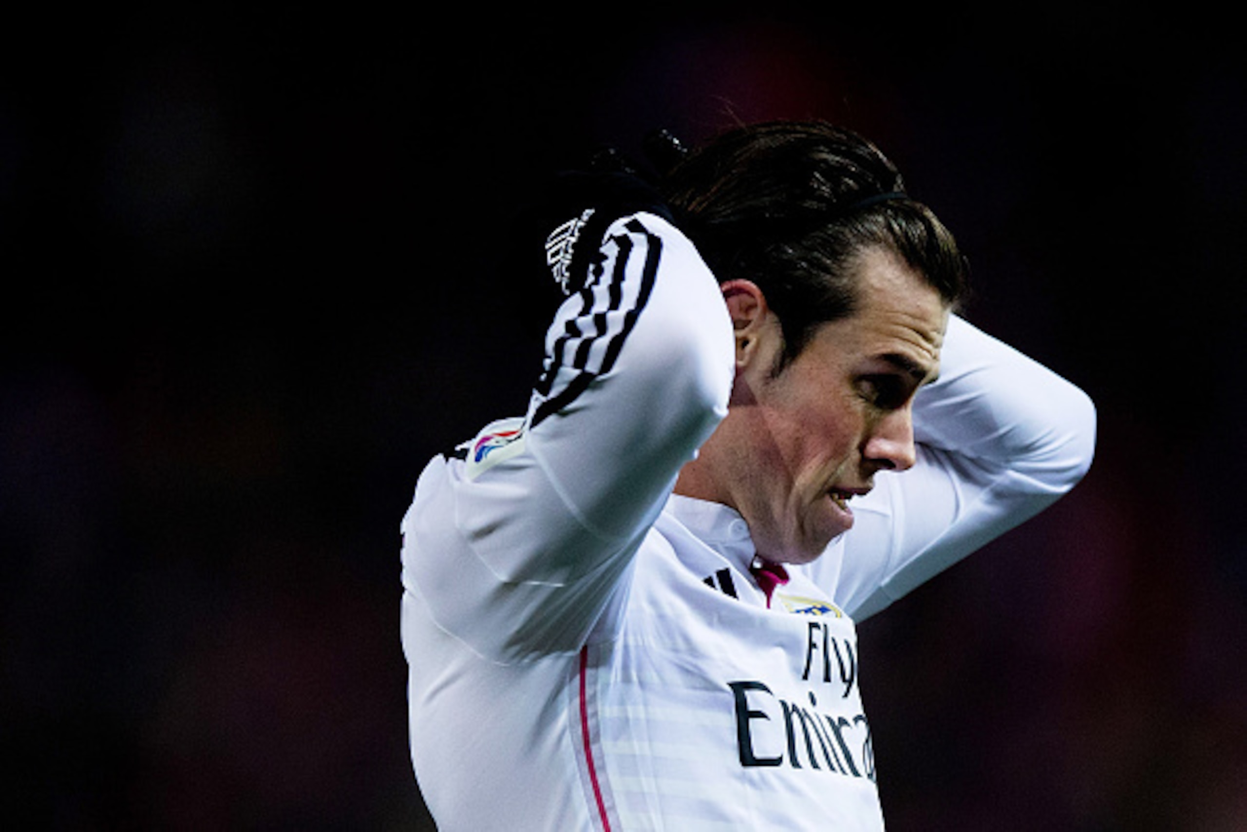 MADRID, SPAIN - JANUARY 07: Gareth Bale of Real Madrid CF reacts as he fail to score during the Copa del Rey Round of 16  first leg match between Club Atletico de Madrid and Real Madrid CF at Vicente Calderon Stadium on January 7, 2015 in Madrid, Spain.  