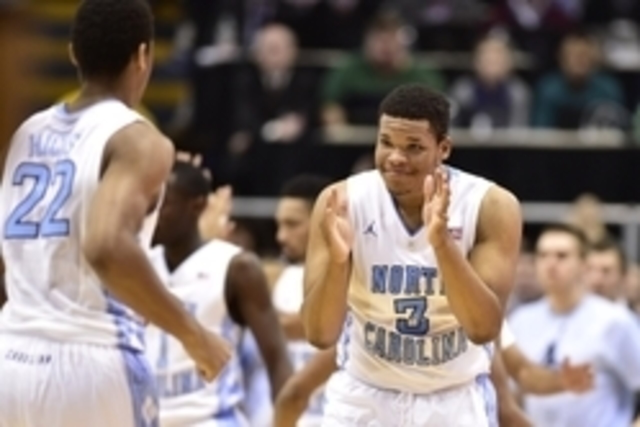 Jan 10, 2015; Chapel Hill, NC, USA; North Carolina Tar Heels forward Kennedy Meeks (3) reacts with forward Isaiah Hicks (22) in the first half at Dean E. Smith Center. Mandatory Credit: Bob Donnan-USA TODAY Sports