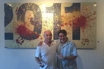 Bill Fickett and Billi Kid with one of Dwyane Wade's pieces as part of "In The Paint."