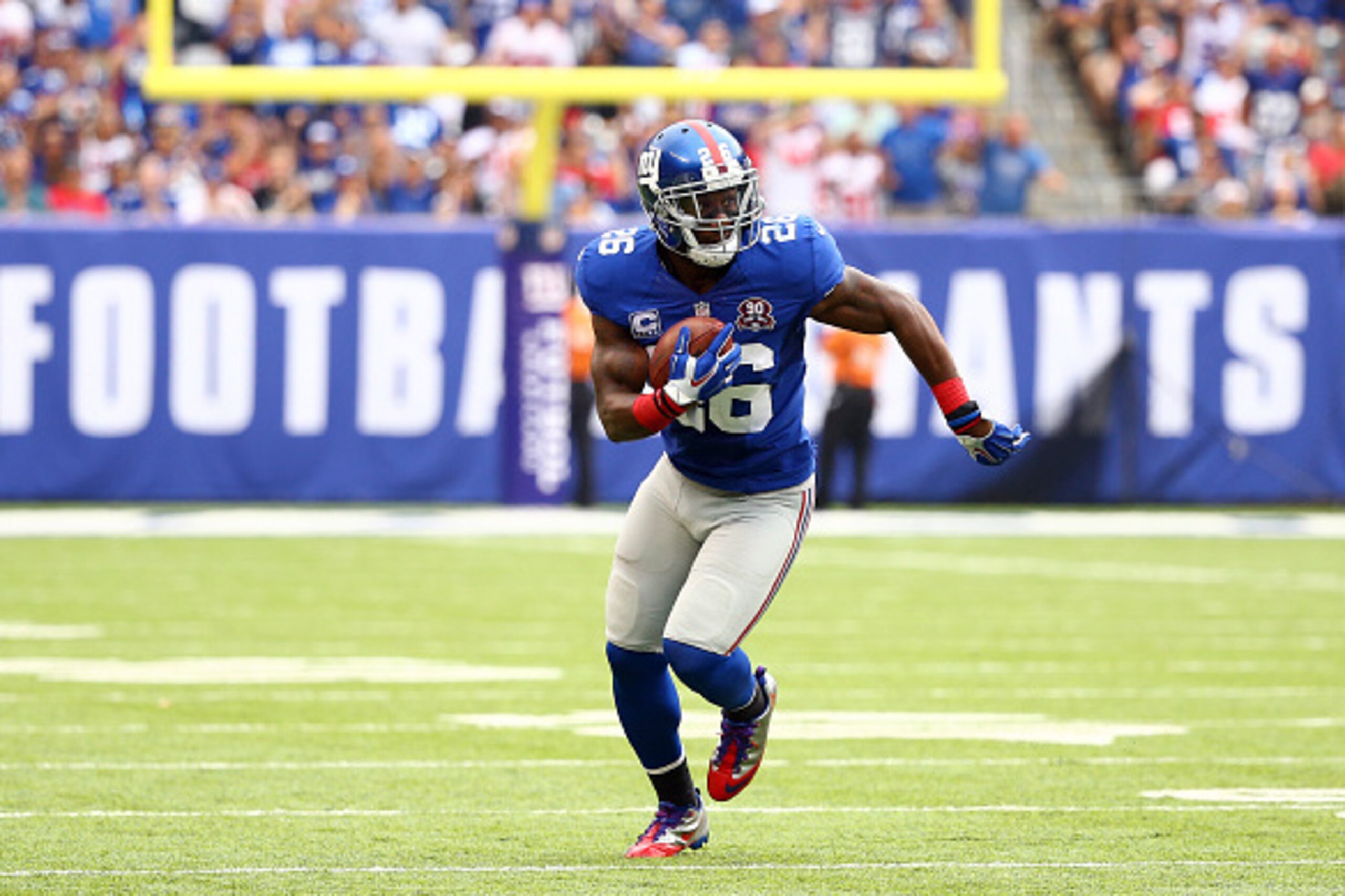 EAST RUTHERFORD, NJ - SEPTEMBER 21:  Antrel Rolle #26 of the New York Giants carries the ball against the Houston Texans at MetLife Stadium on September 21, 2014 in East Rutherford, New Jersey.  (Photo by Al Bello/Getty Images)