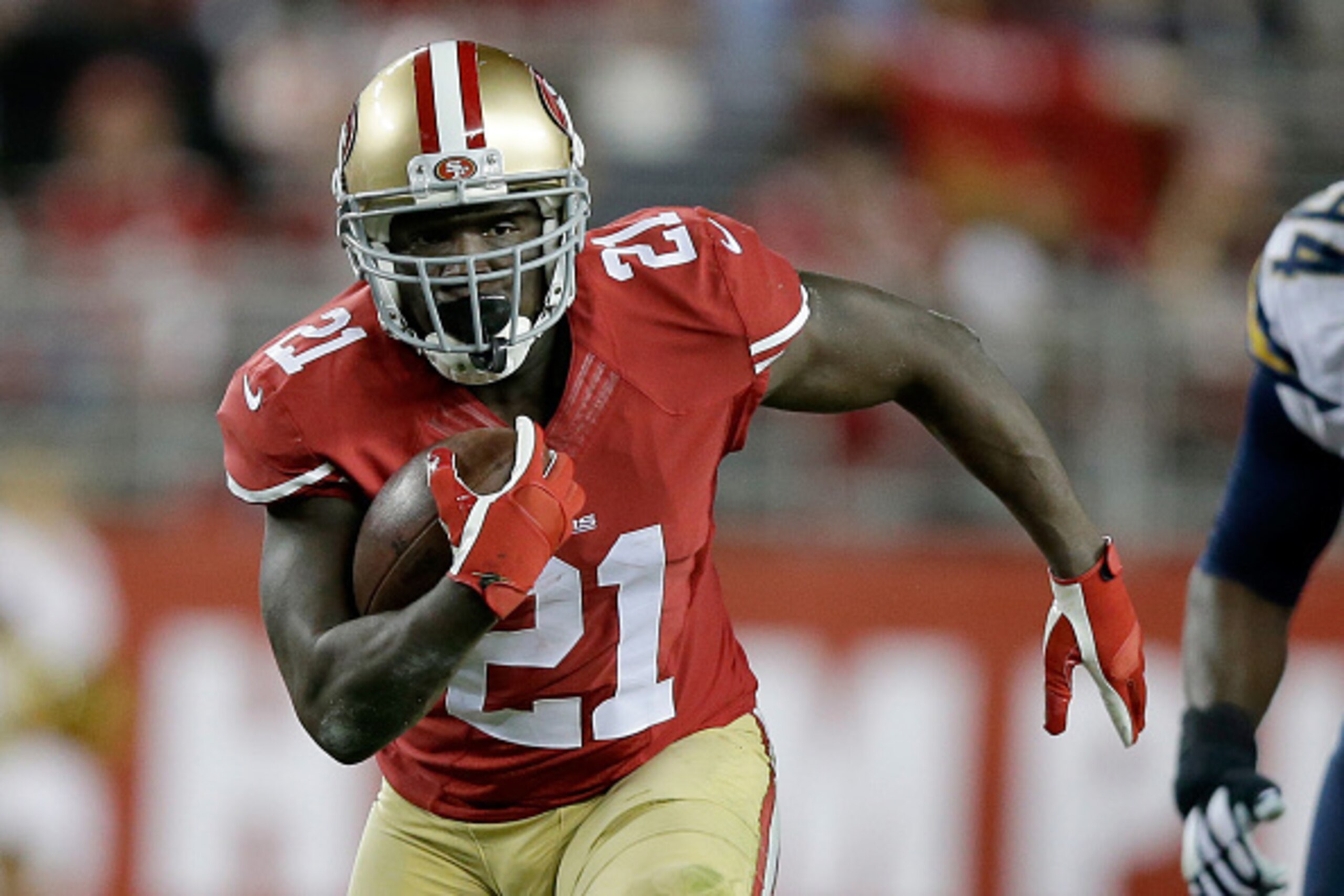 SANTA CLARA, CA - DECEMBER 20:  Running back Frank Gore #21 of the San Francisco 49ers runs the ball in the first half against the San Diego Chargers at Levi's Stadium on December 20, 2014 in Santa Clara, California.  (Photo by Ezra Shaw/Getty Images)