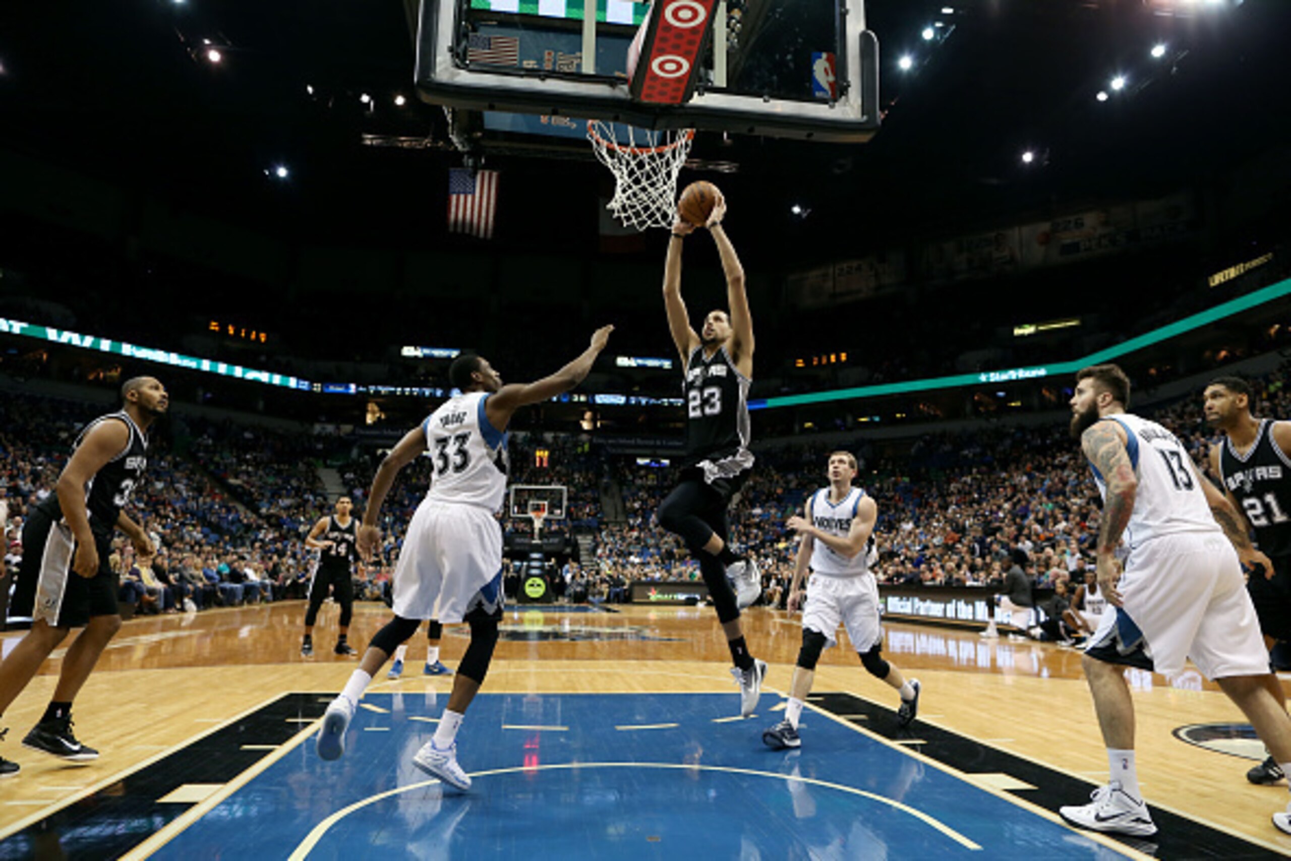 MINNEAPOLIS, MN - JANUARY 10: Austin Daye #23 of the San Antonio Spurs shoots against the Minnesota Timberwolves on January 10, 2015 at Target Center in Minneapolis, Minnesota. NOTE TO USER: User expressly acknowledges and agrees that, by downloading and 