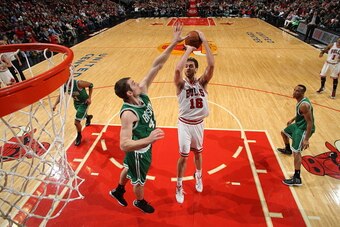 CHICAGO, IL - JANUARY 3: Pau Gasol #16 of the Chicago Bulls goes up for a shot against the Boston Celtics on January 3, 2015 at the United Center in Chicago, Illinois. NOTE TO USER: User expressly acknowledges and agrees that, by downloading and or using 