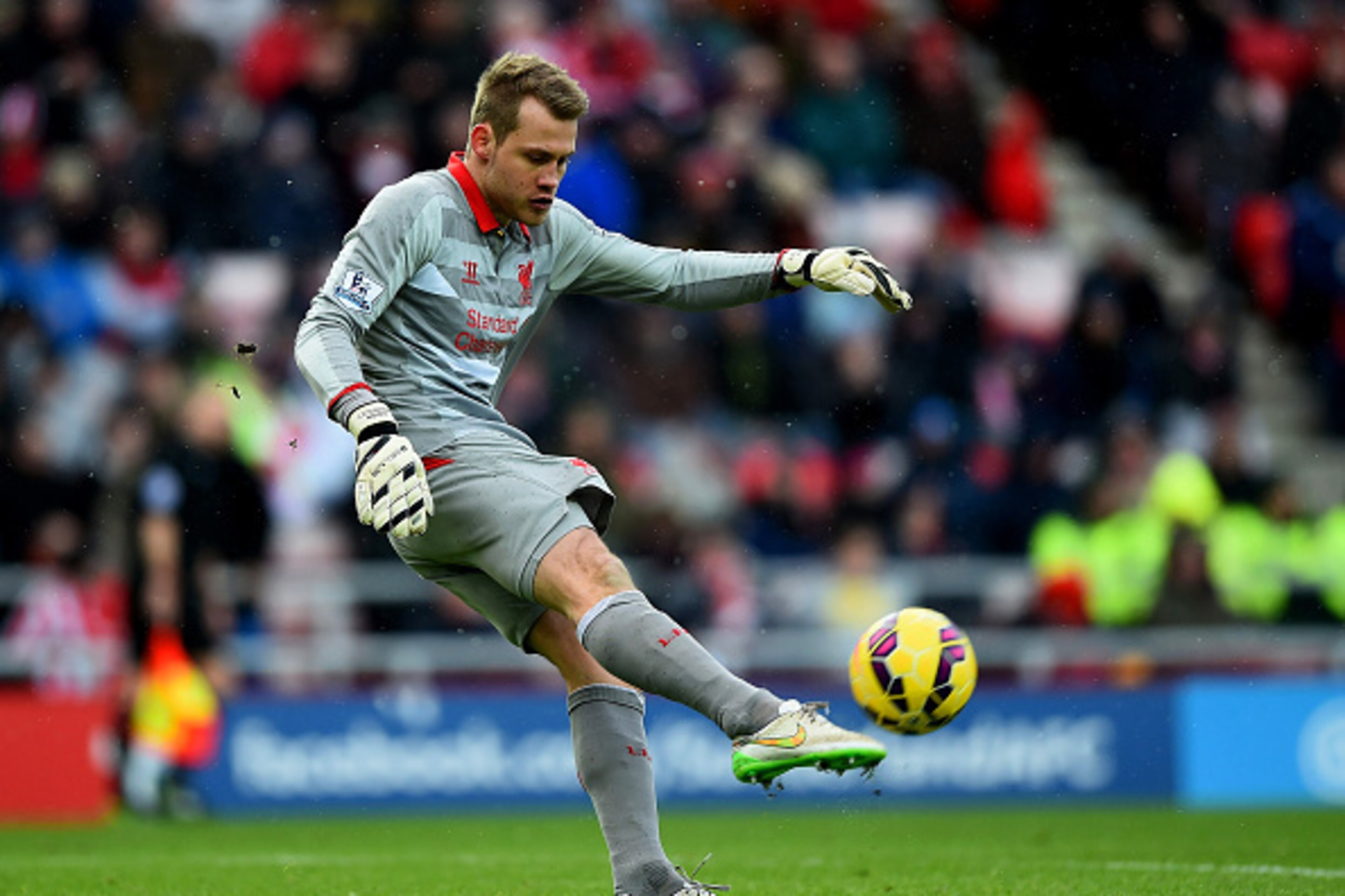 SUNDERLAND, ENGLAND - JANUARY 10:  Simon Mignolet of Liverpool kicks the ball during the Barclays Premier League match between Sunderland and Liverpool at Stadium of Light on January 10, 2015 in Sunderland, England.  (Photo by Laurence Griffiths/Getty Ima