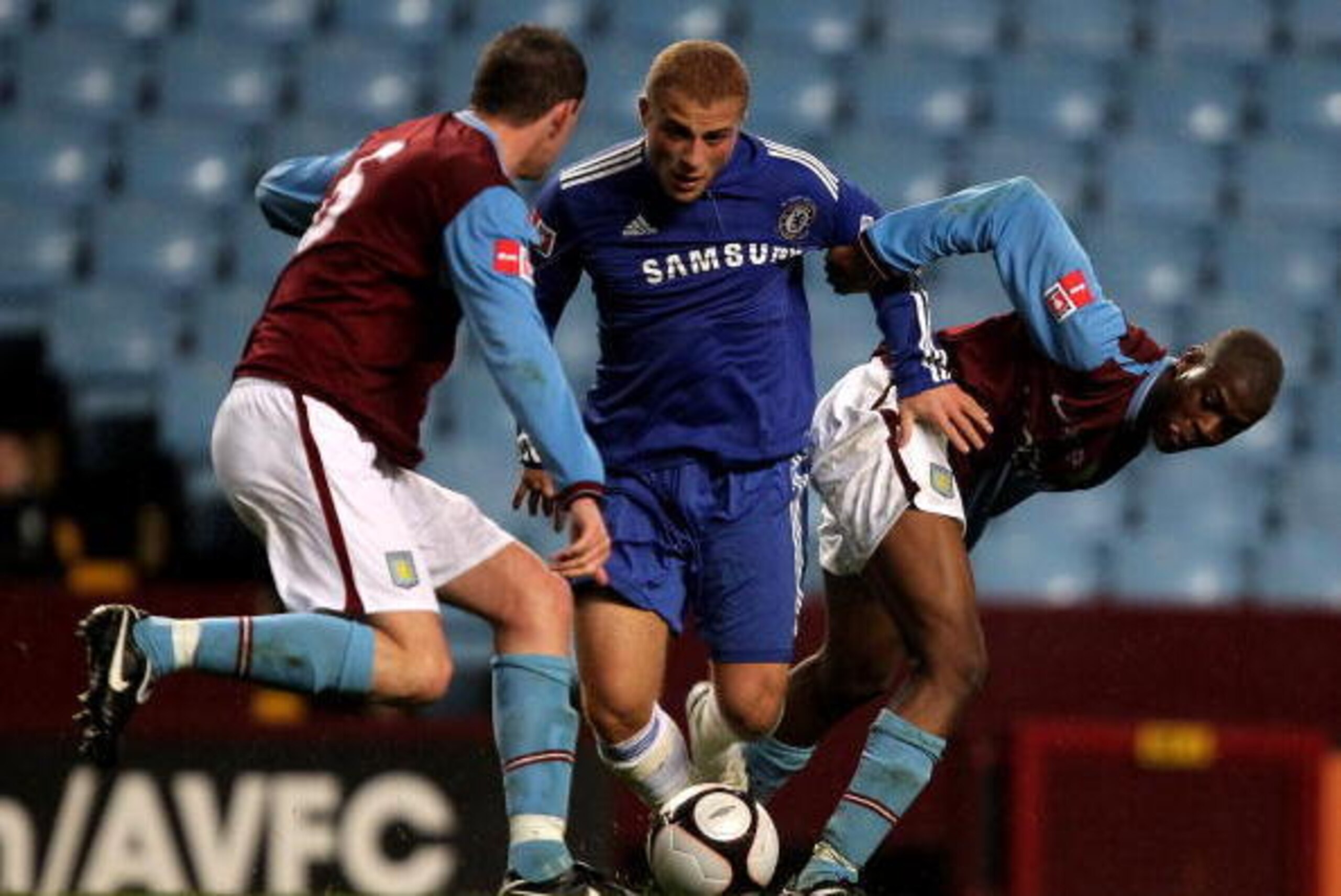 BIRMINGHAM, ENGLAND - APRIL 29:  Gokhan Tore of Chelsea is challenged by Ebby Nelson-Addy (R) and Richard Blythe during the FA Youth Cup Final 1st leg between Aston Villa and Chelsea at Villa Park on April 29, 2010 in Birmingham, England.  (Photo by David